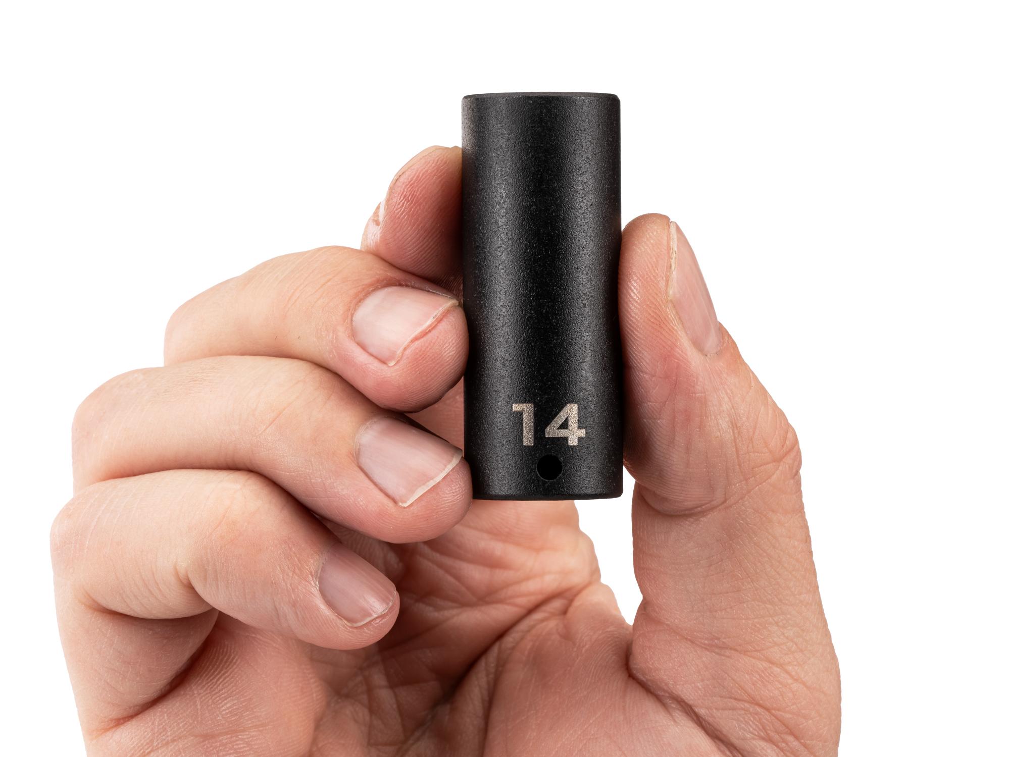 Person holding Tekton impact drive 6-point socket. Item #SID03114