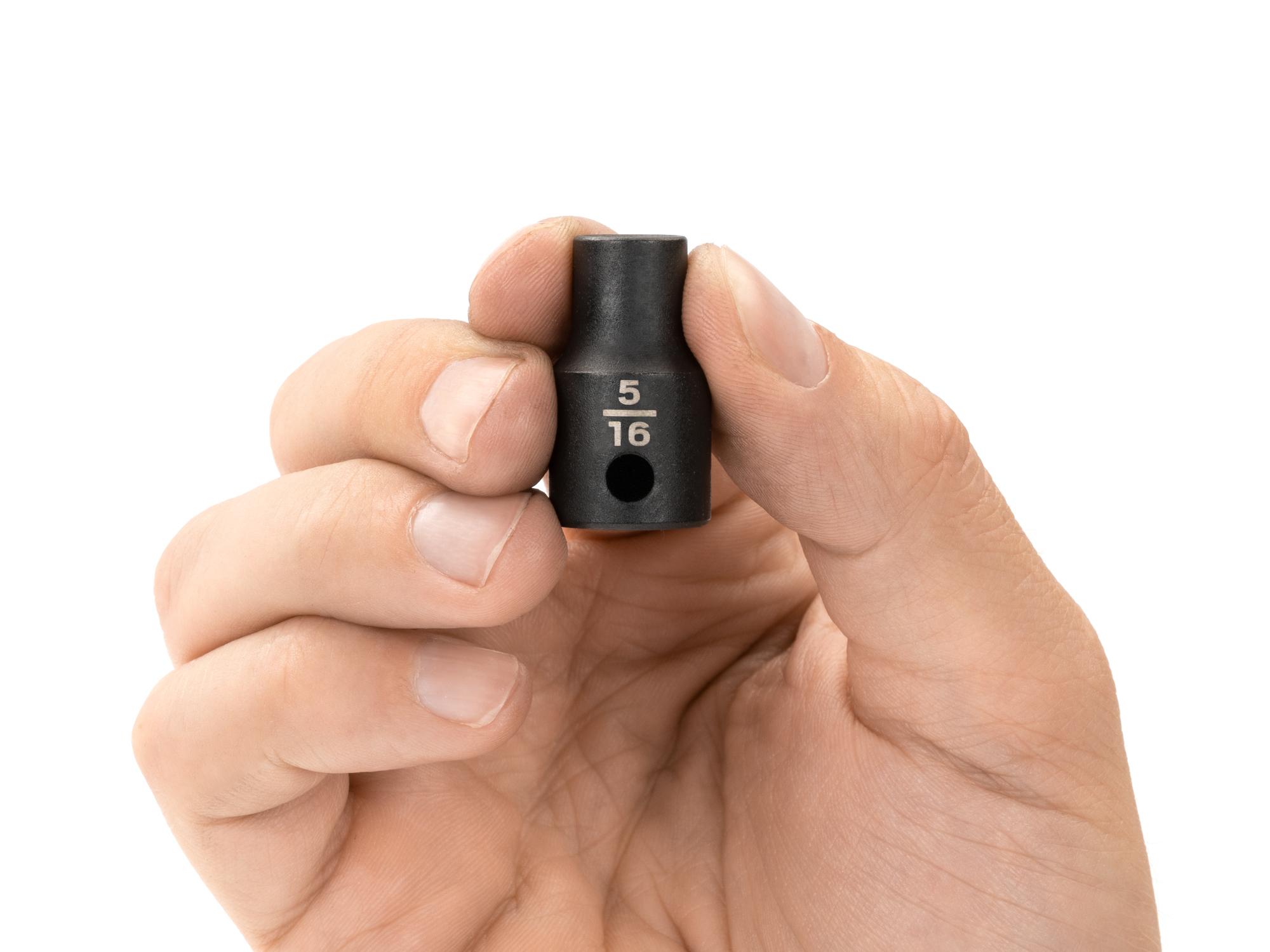 Person holding Tekton impact drive 12-point socket. Item #SID12208
