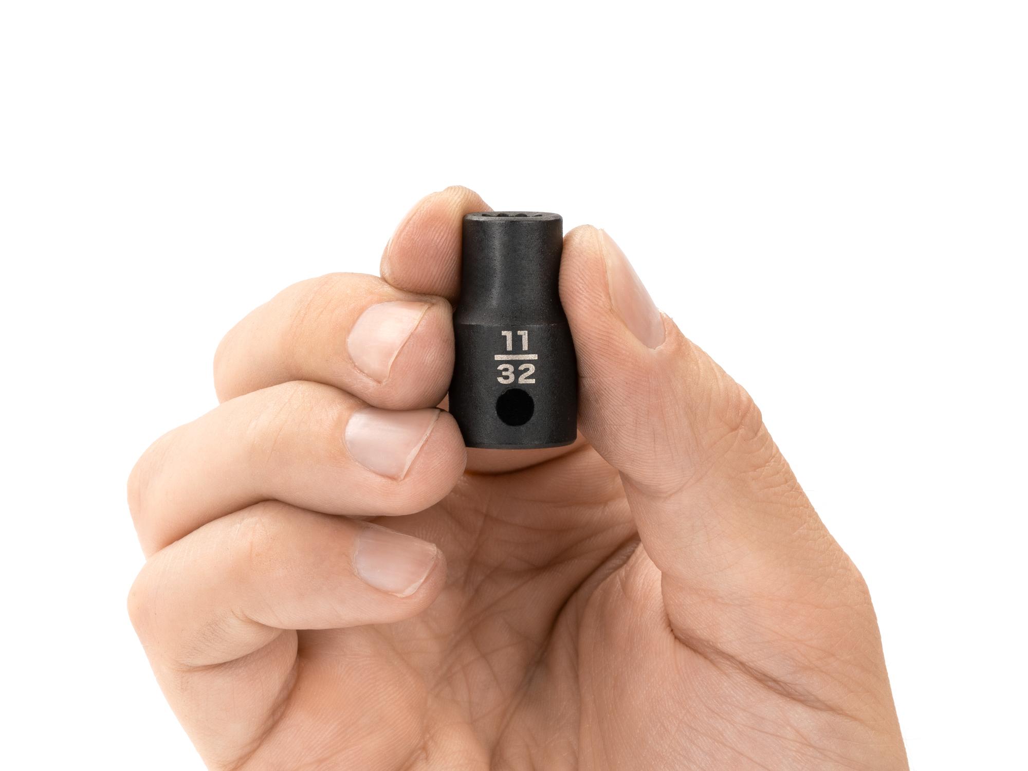 Person holding Tekton impact drive 12-point socket. Item #SID12209