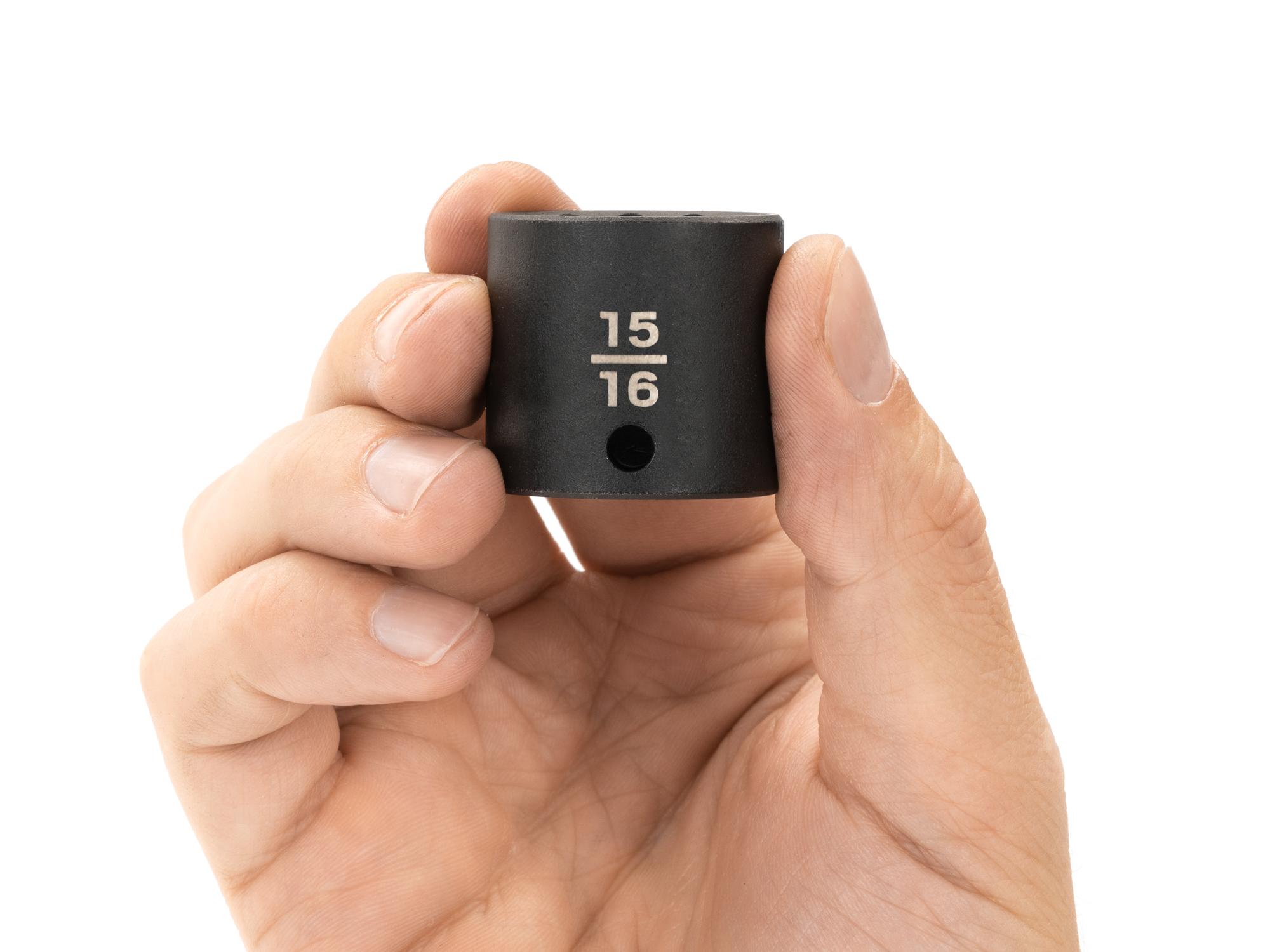 Person holding Tekton impact drive 12-point socket. Item #SID12224