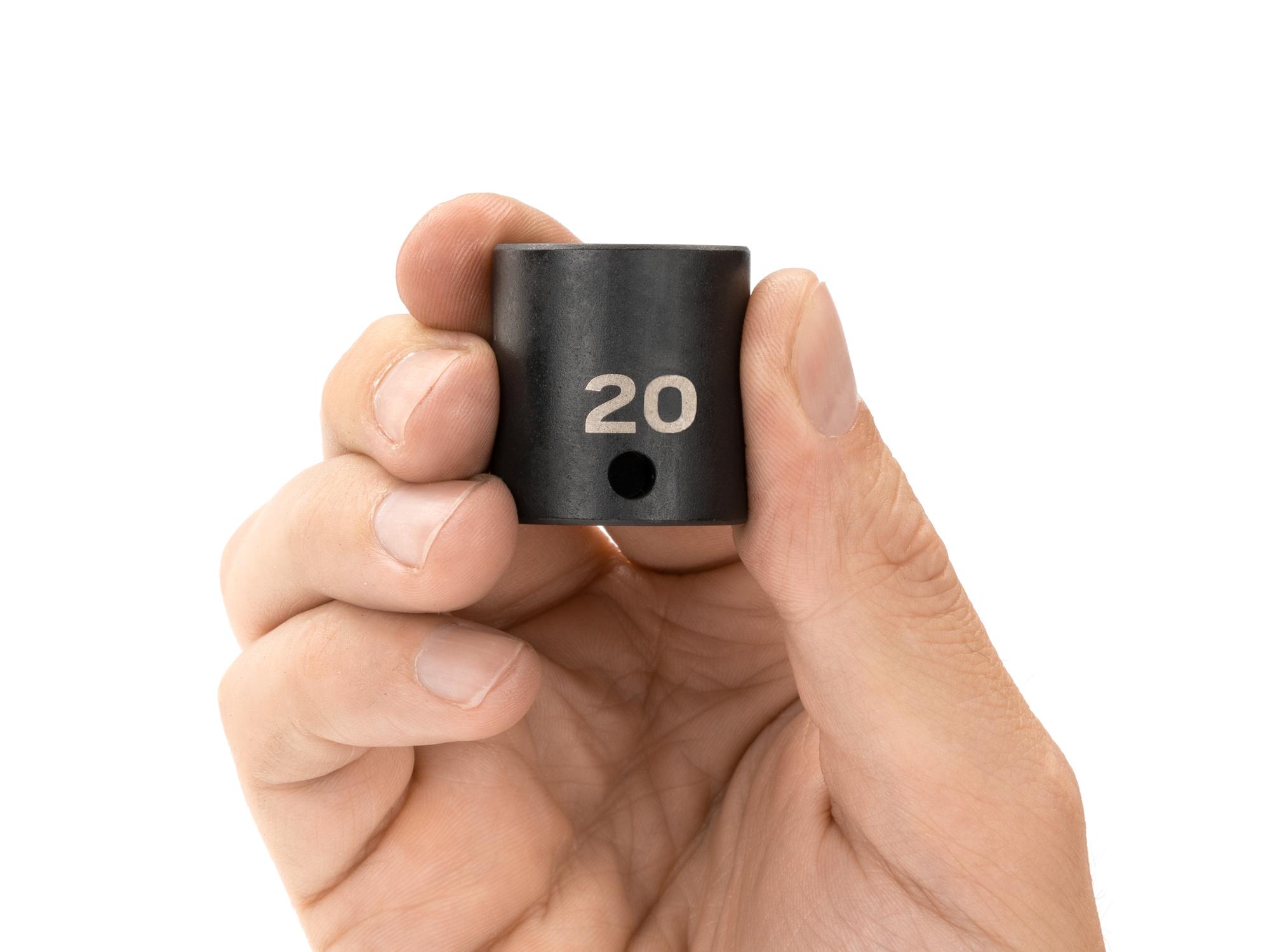 Person holding Tekton impact drive 12-point socket. Item #SID12320