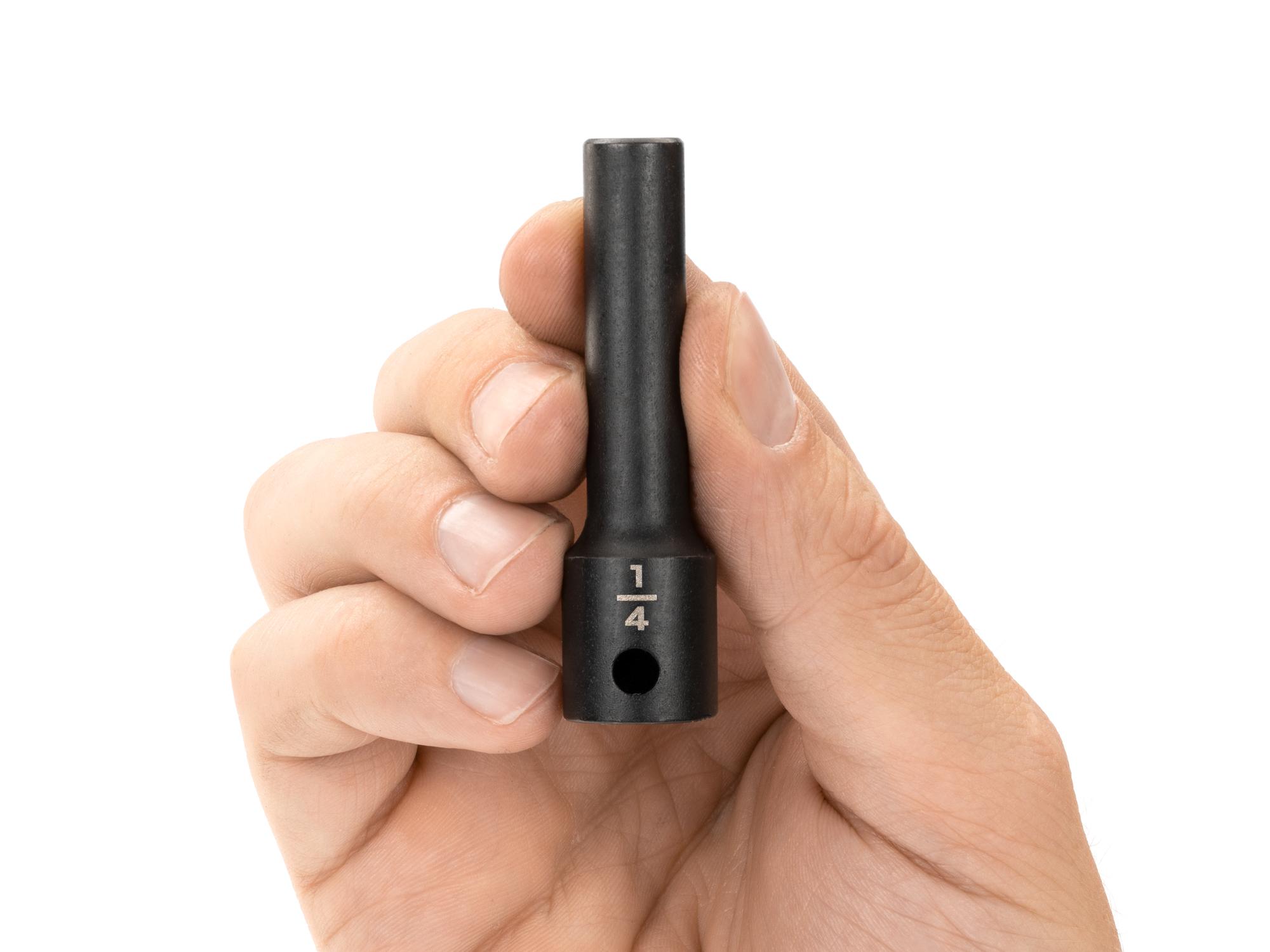 Person holding Tekton impact drive 12-point socket. Item #SID13206