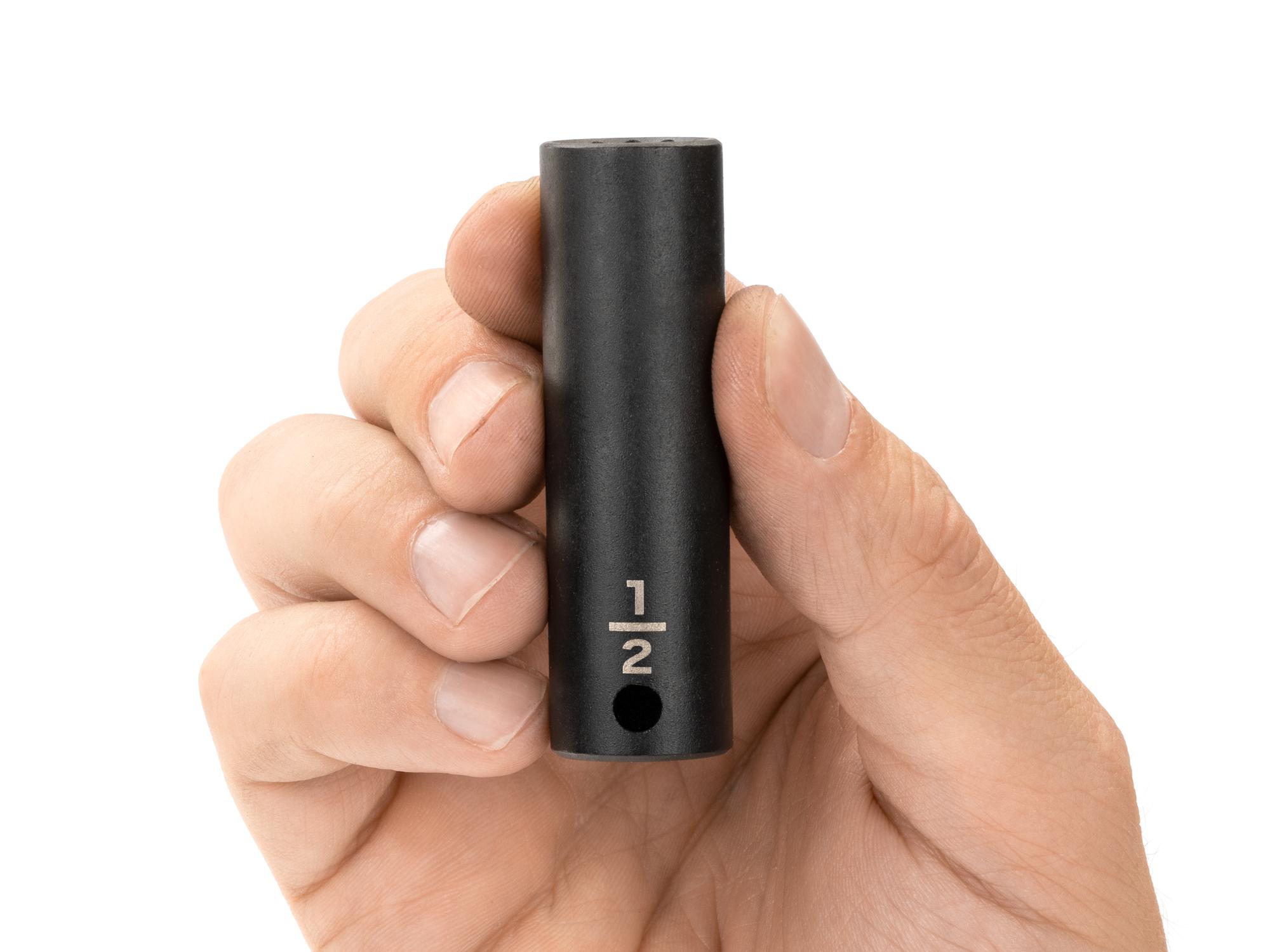 Person holding Tekton impact drive 12-point socket. Item #SID13213