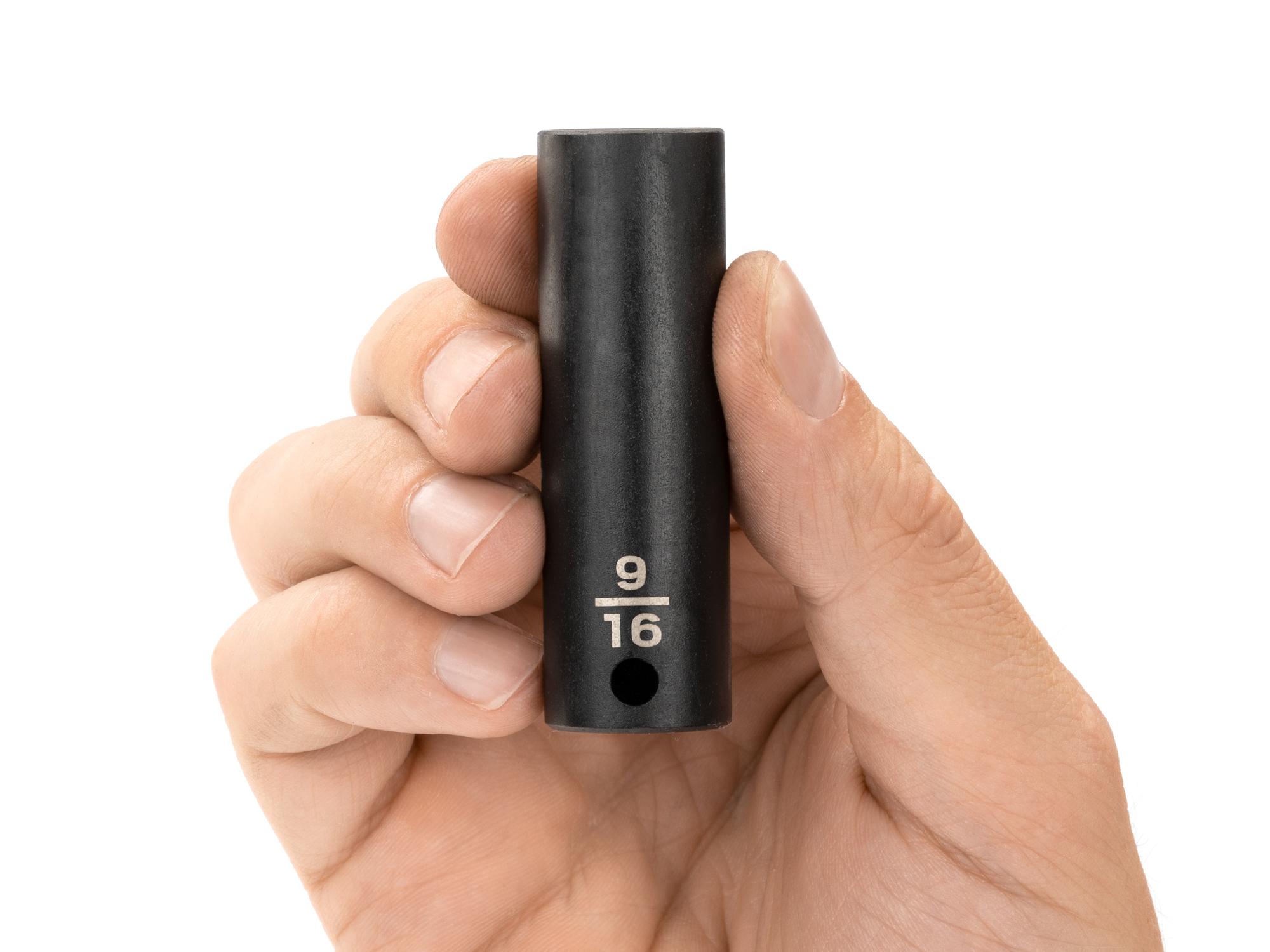Person holding Tekton impact drive 12-point socket. Item #SID13214