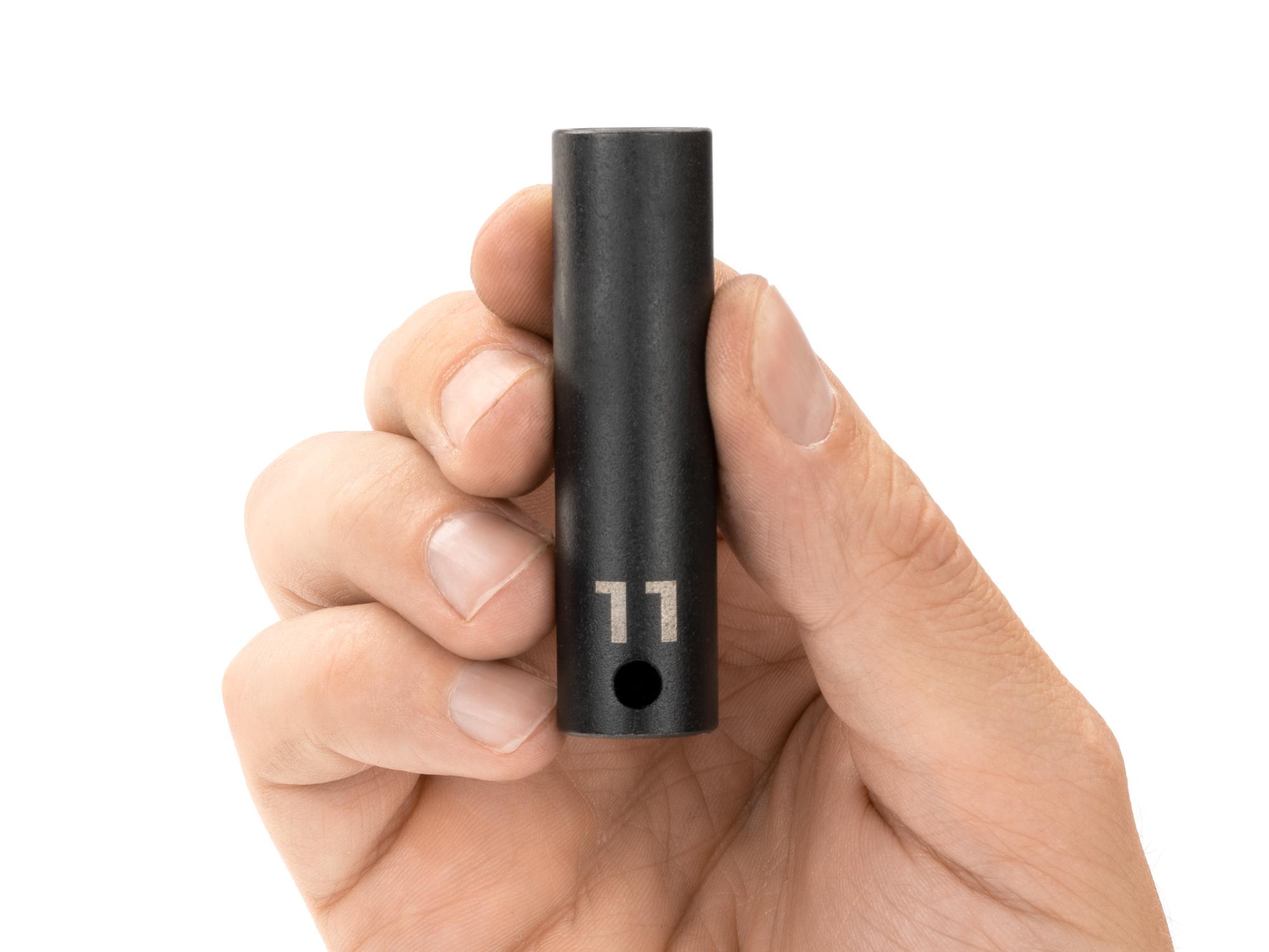 Person holding Tekton impact drive 12-point socket. Item #SID13311