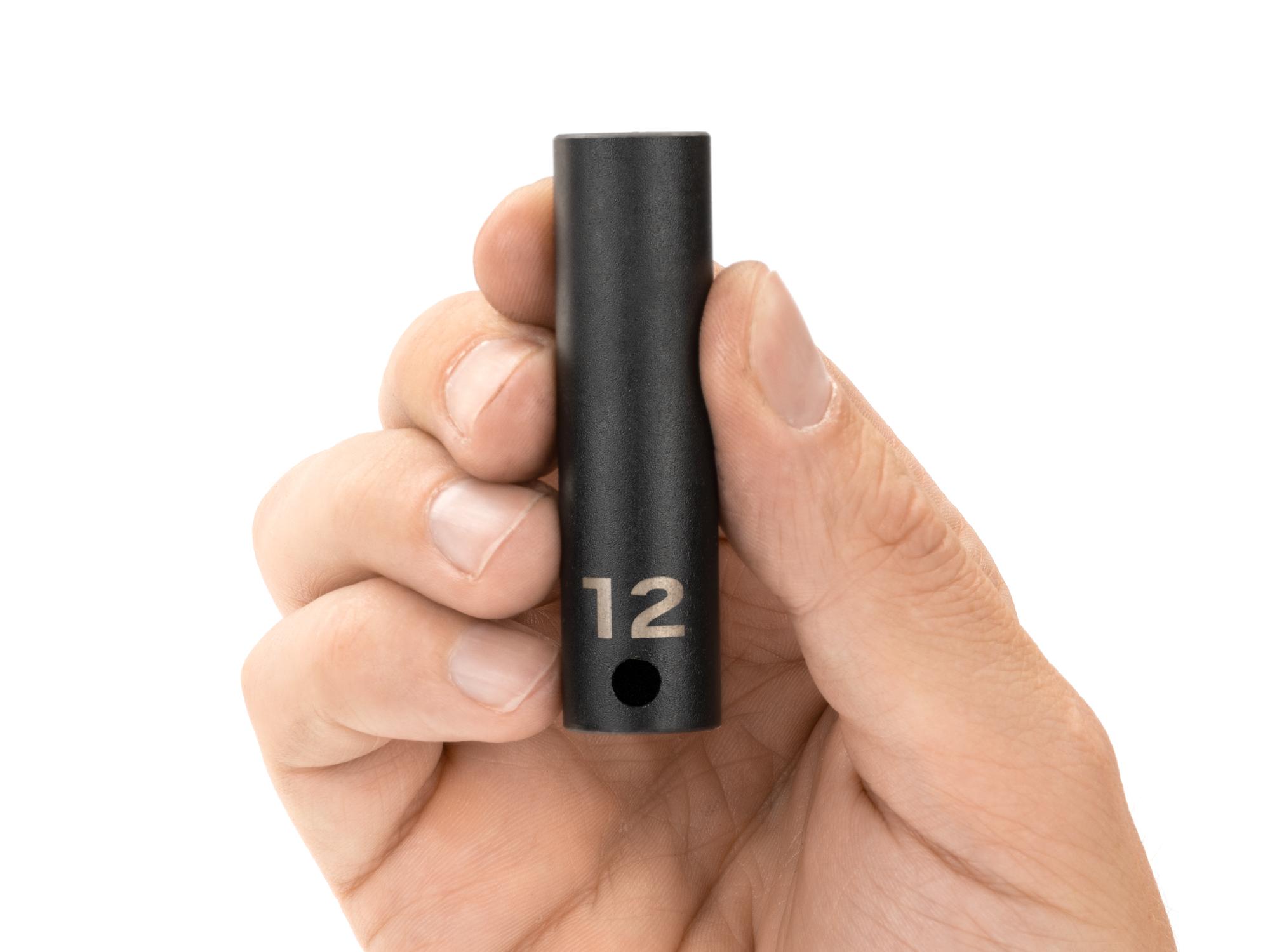 Person holding Tekton impact drive 12-point socket. Item #SID13312
