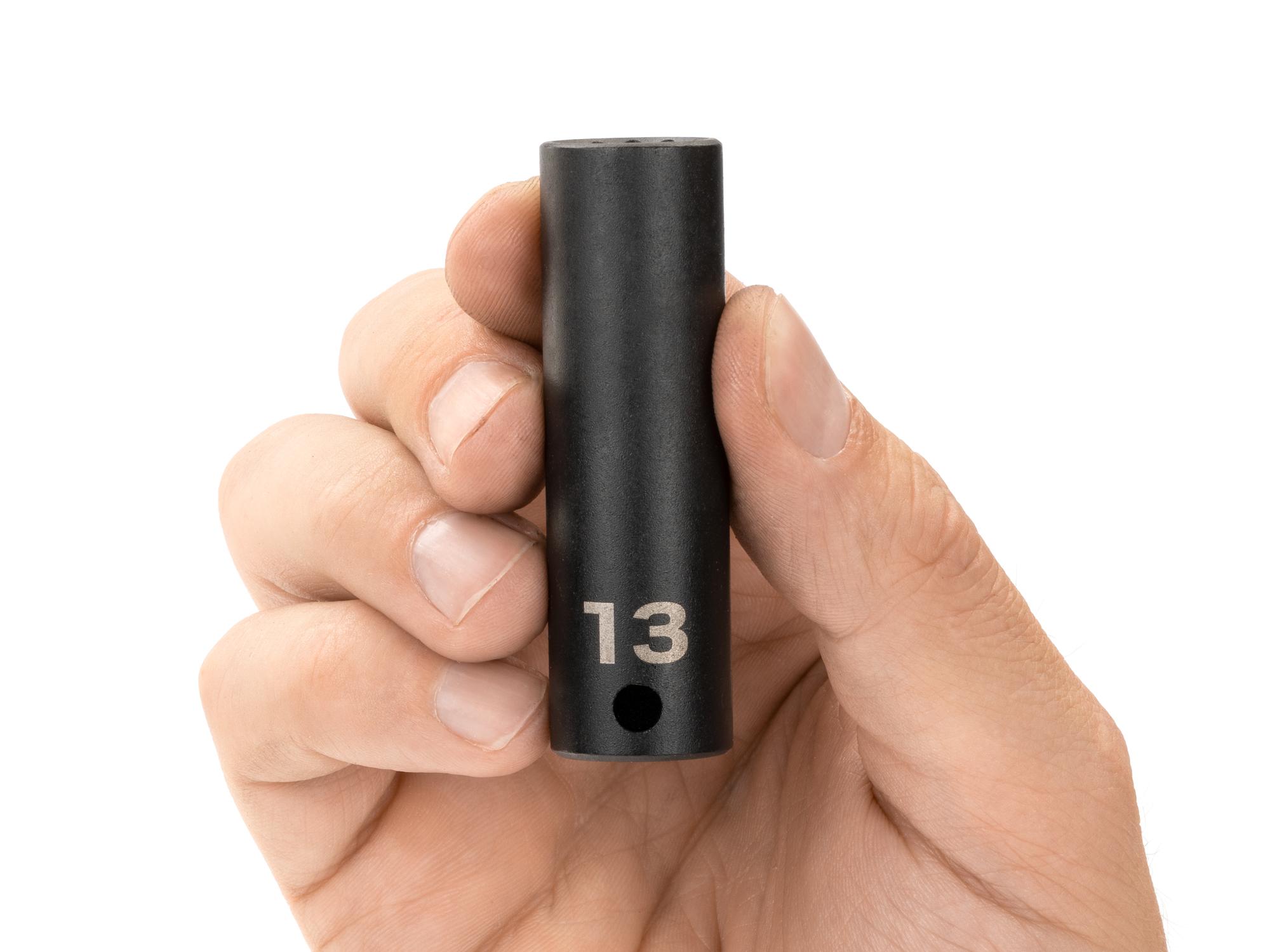 Person holding Tekton impact drive 12-point socket. Item #SID13313