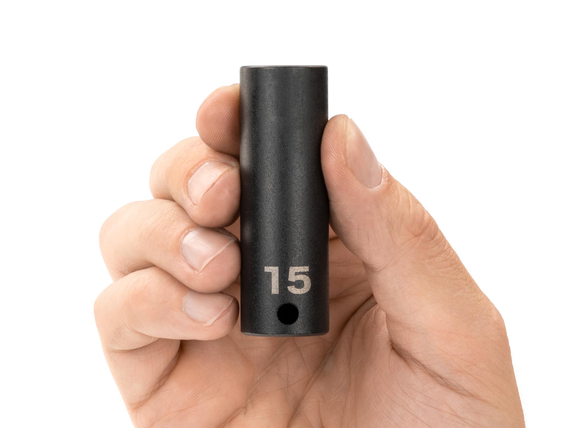 Person holding Tekton impact drive 12-point socket. Item #SID13315