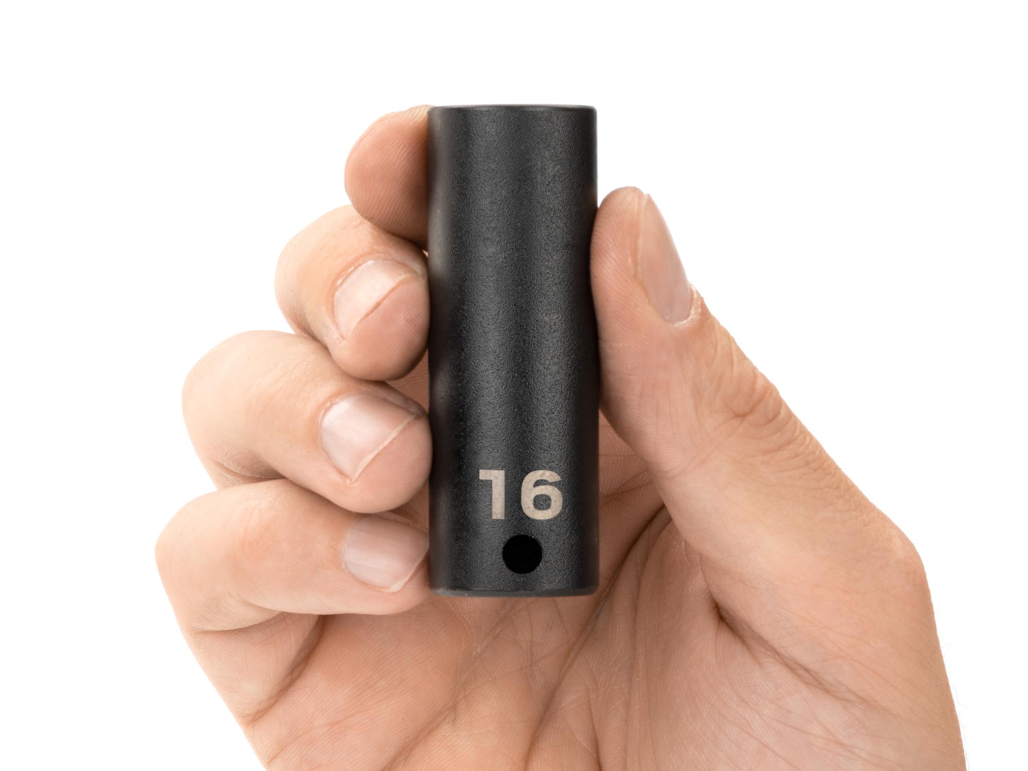 Person holding Tekton impact drive 12-point socket. Item #SID13316