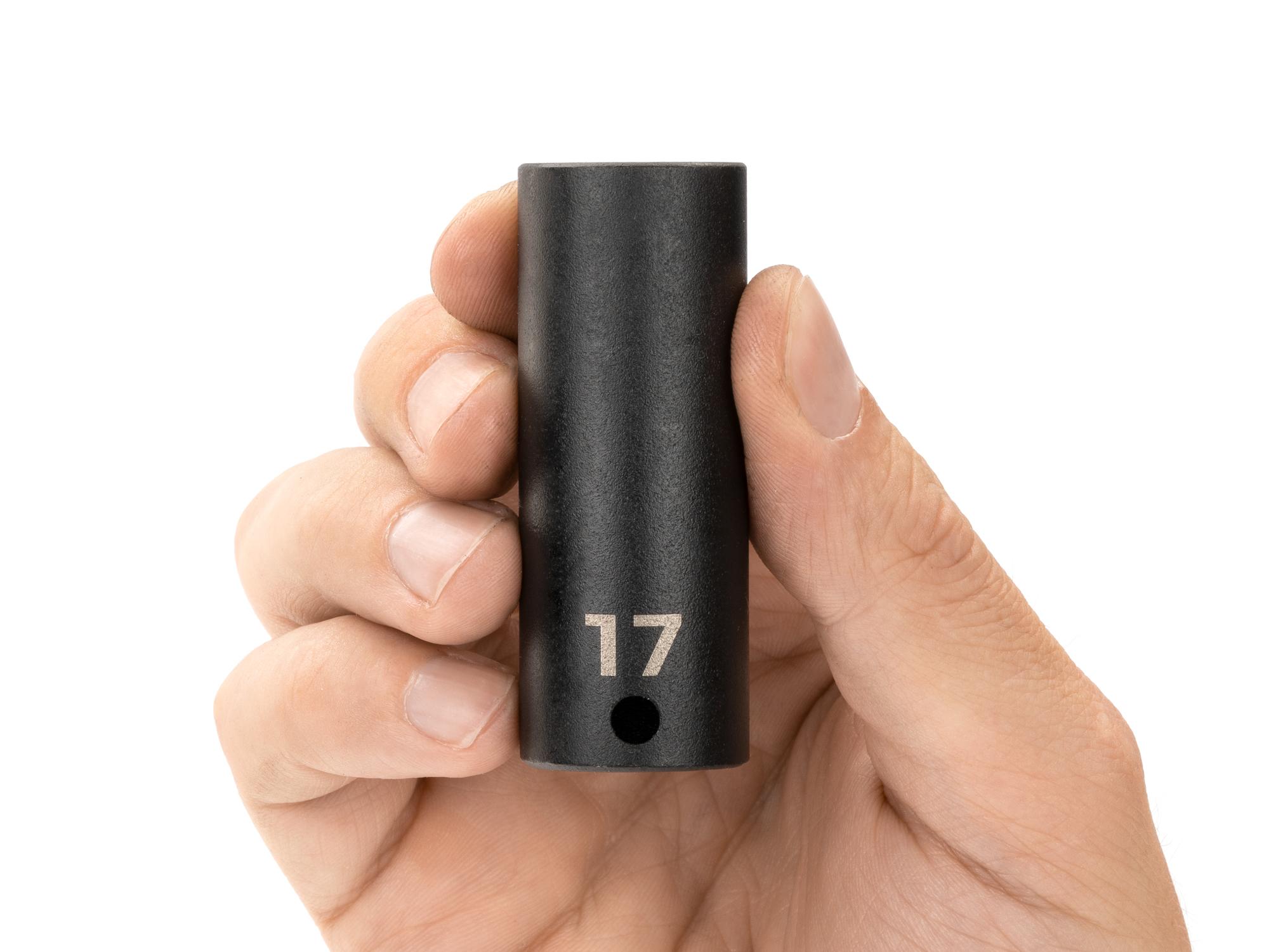 Person holding Tekton impact drive 12-point socket. Item #SID13317