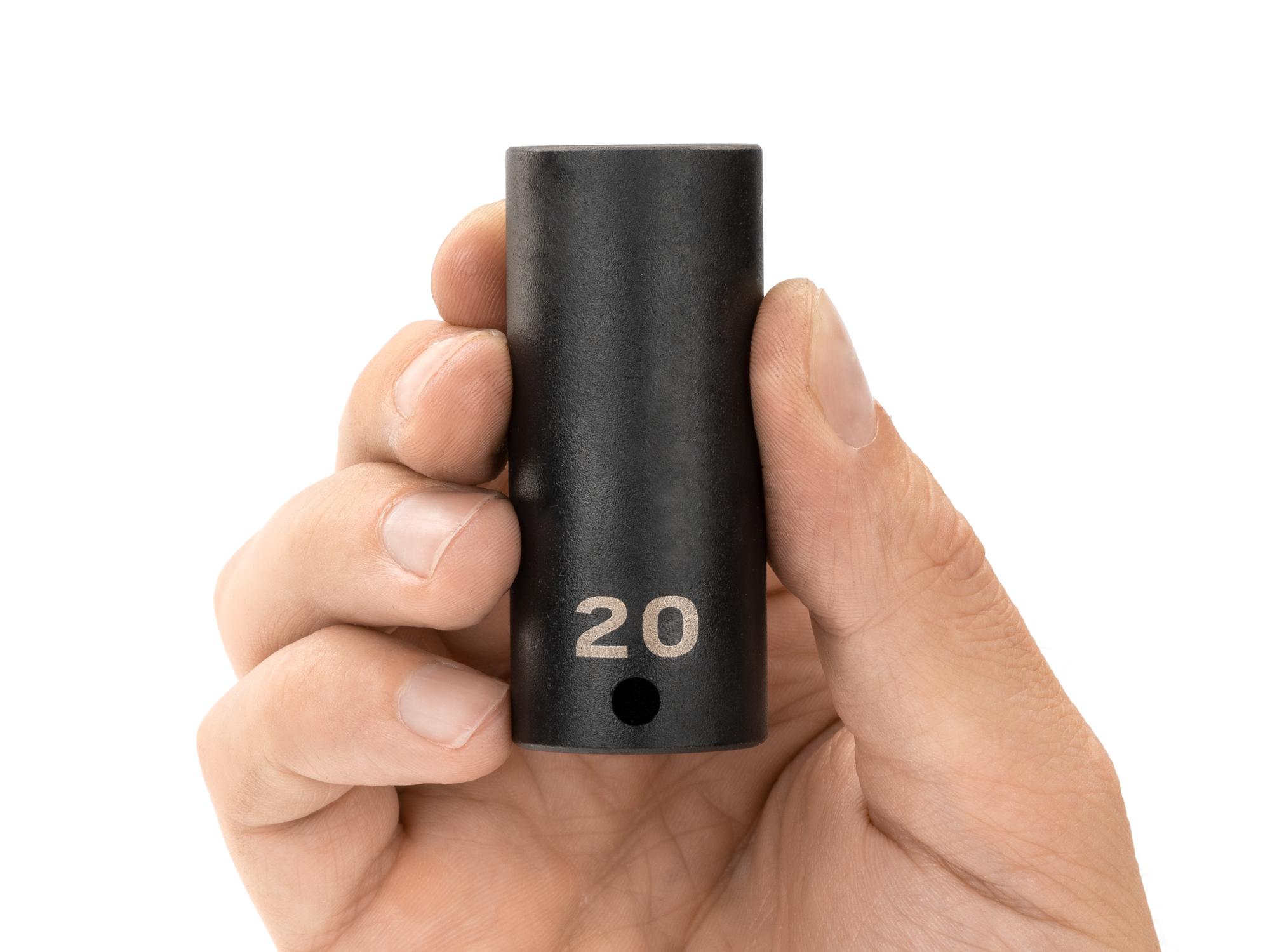 Person holding Tekton impact drive 12-point socket. Item #SID13320