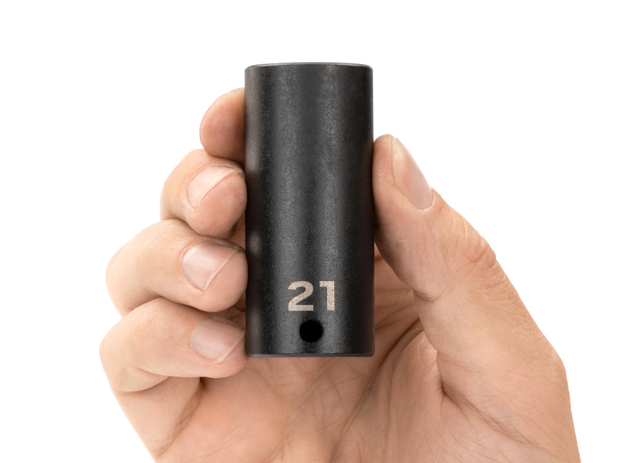 Person holding Tekton impact drive 12-point socket. Item #SID13321