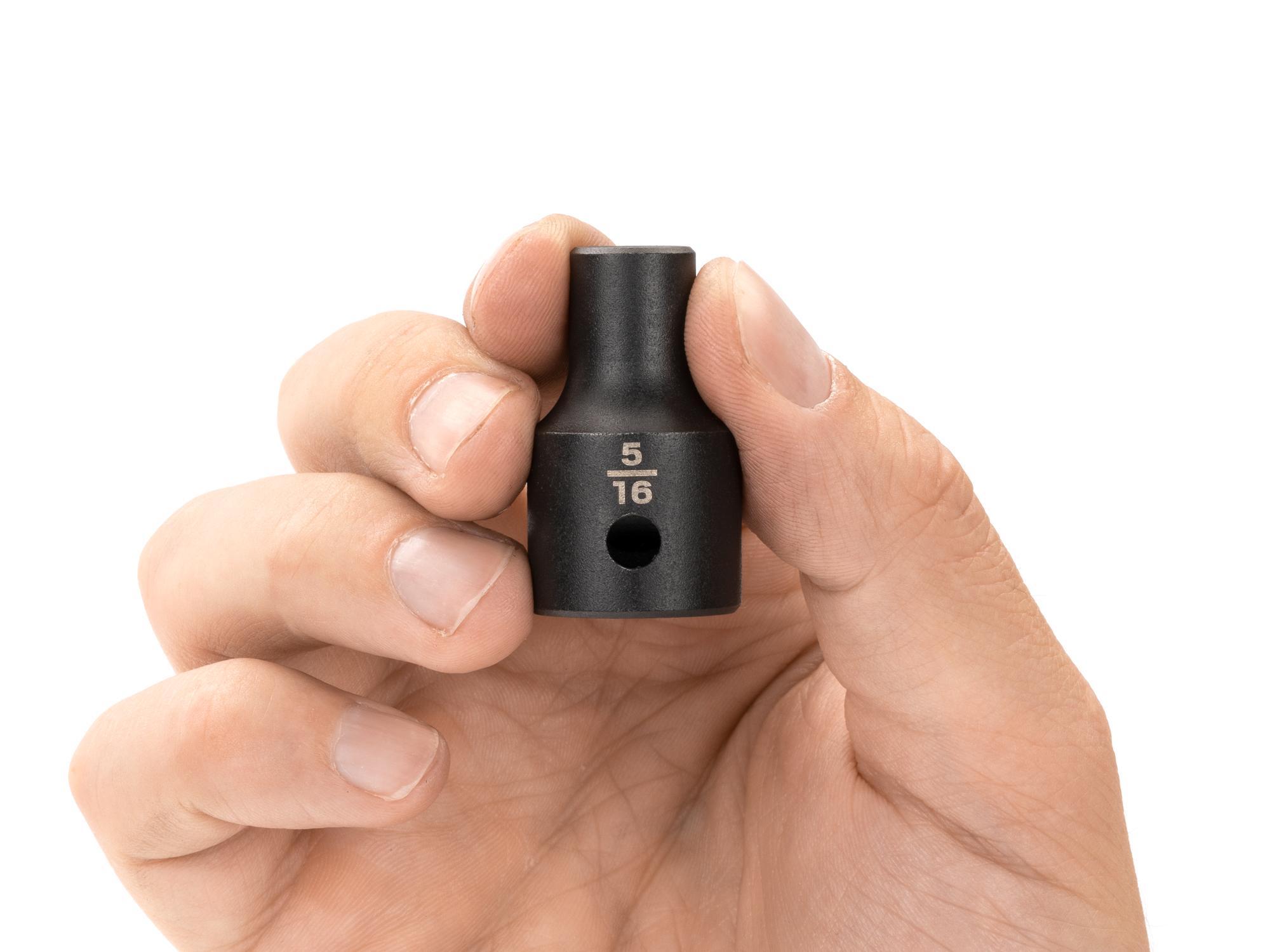 Person holding Tekton impact drive 12-point socket. Item #SID22208
