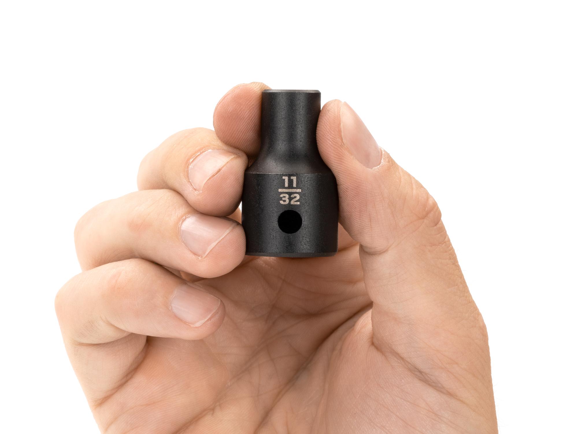 Person holding Tekton impact drive 12-point socket. Item #SID22209