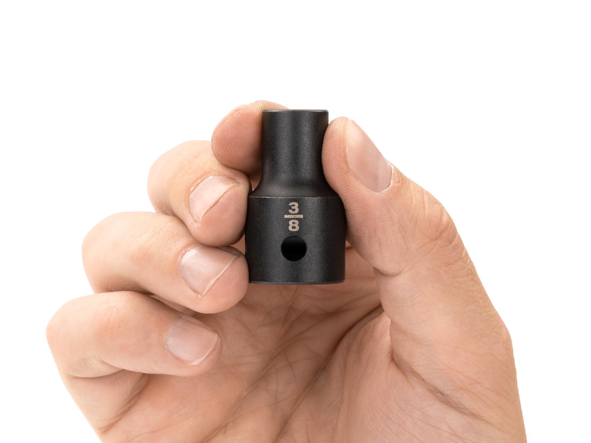 Person holding Tekton impact drive 12-point socket. Item #SID22210