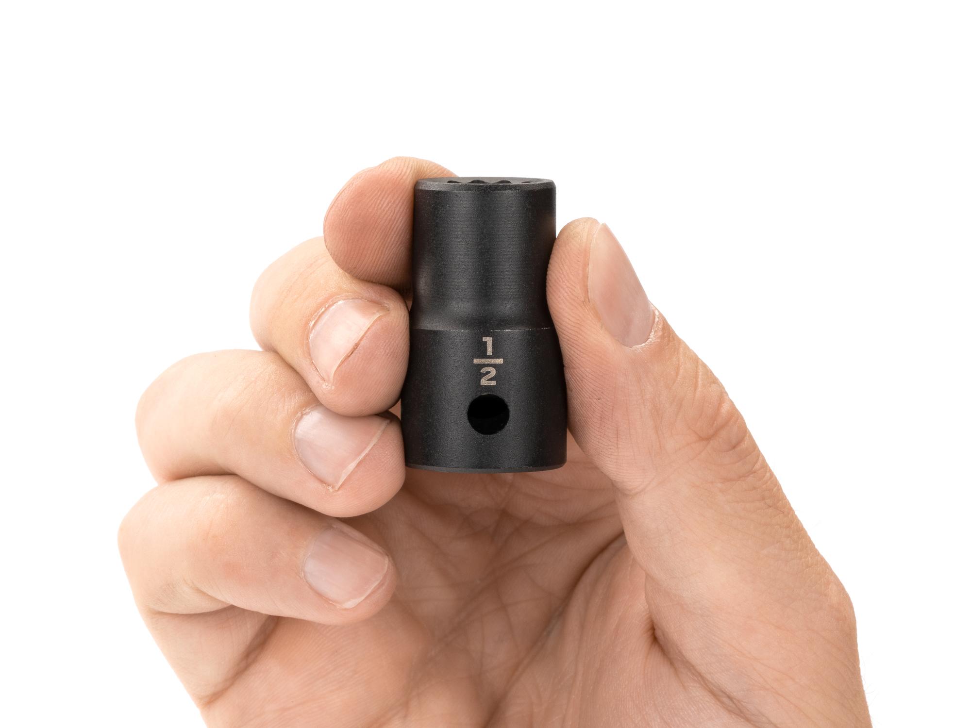 Person holding Tekton impact drive 12-point socket. Item #SID22213