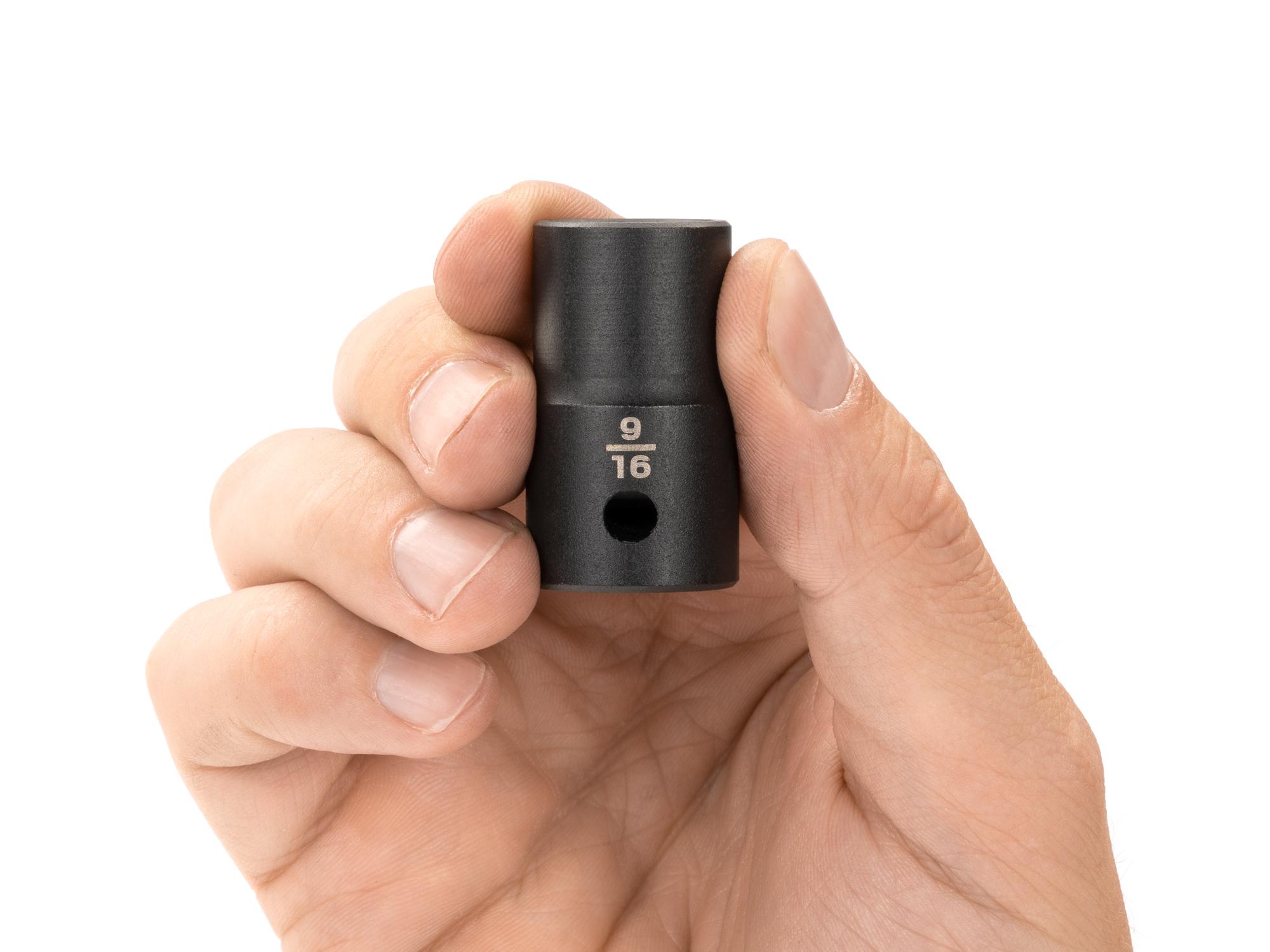 Person holding Tekton impact drive 12-point socket. Item #SID22214