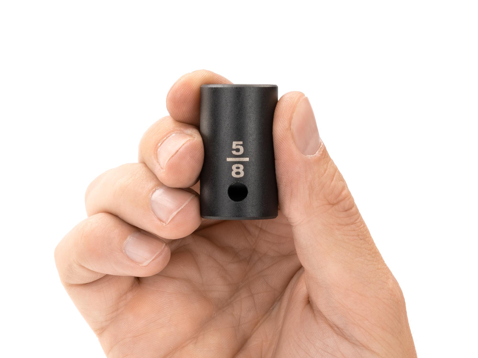 Person holding Tekton impact drive 12-point socket. Item #SID22216