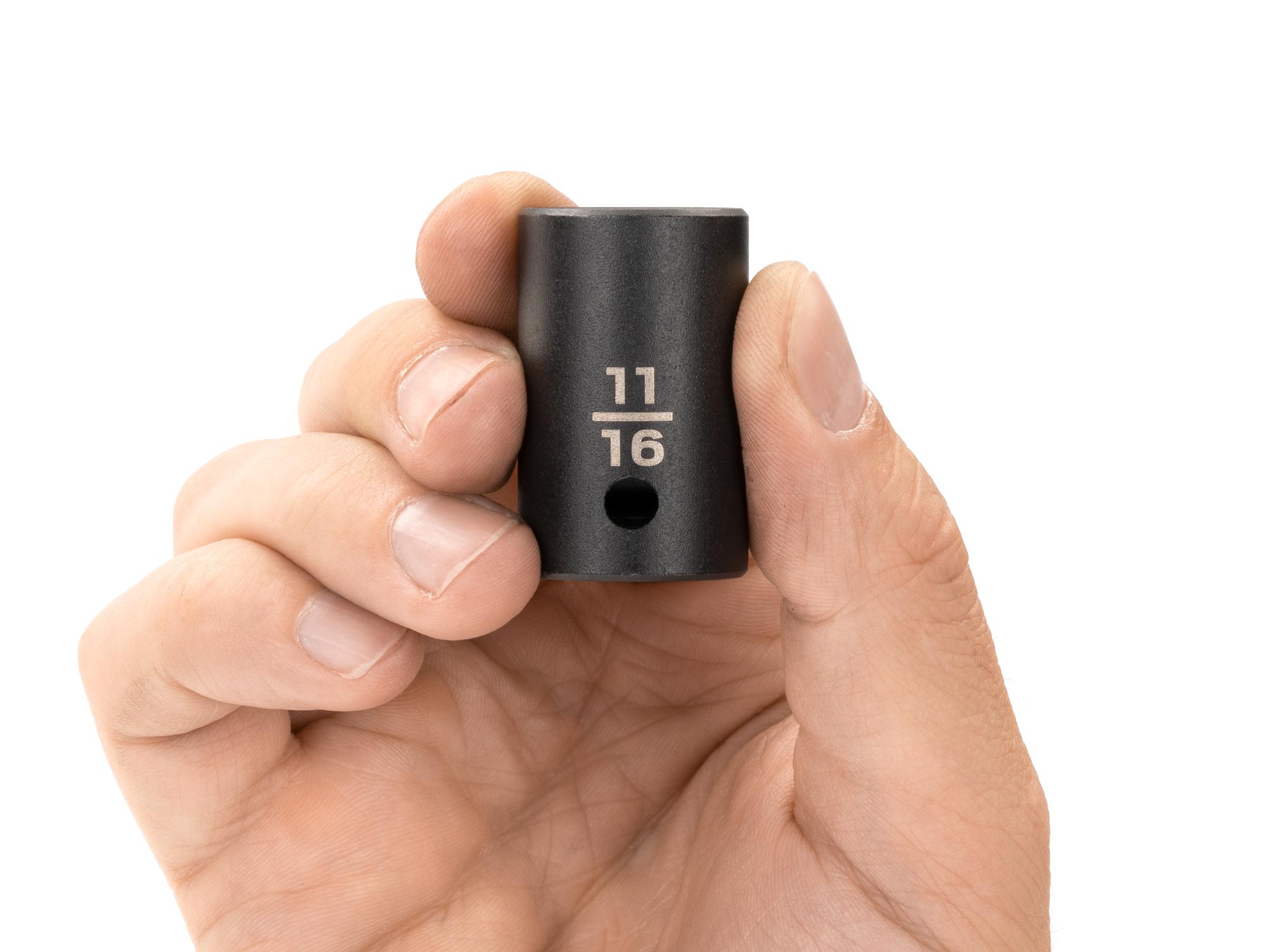Person holding Tekton impact drive 12-point socket. Item #SID22217