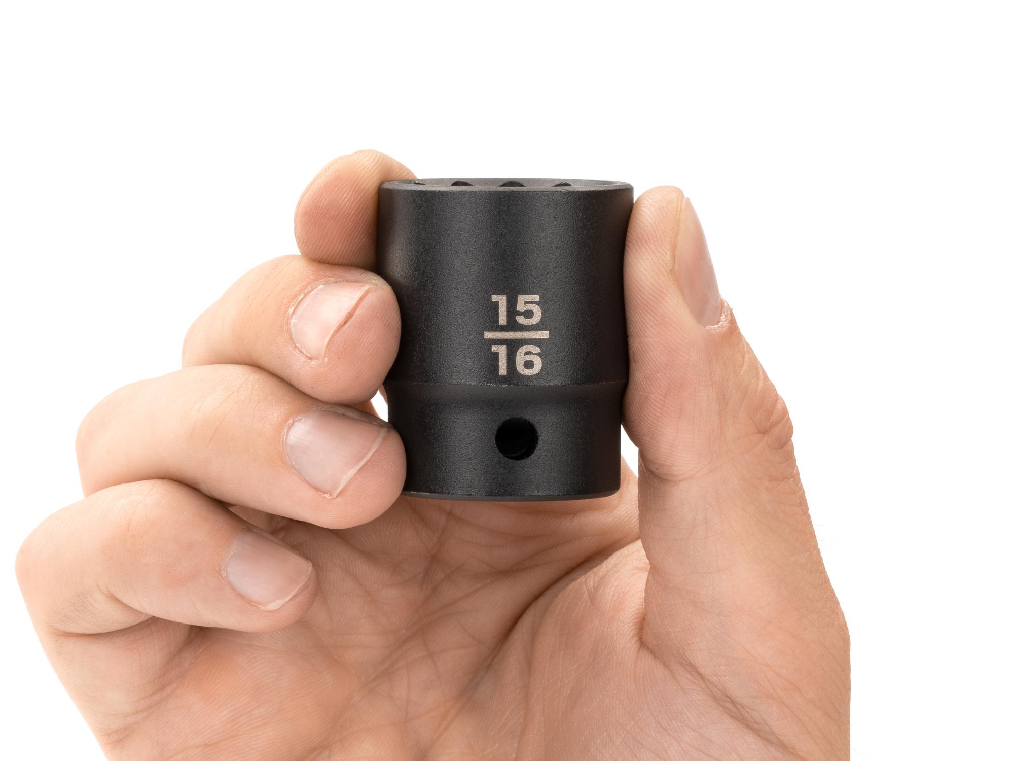 Person holding Tekton impact drive 12-point socket. Item #SID22224
