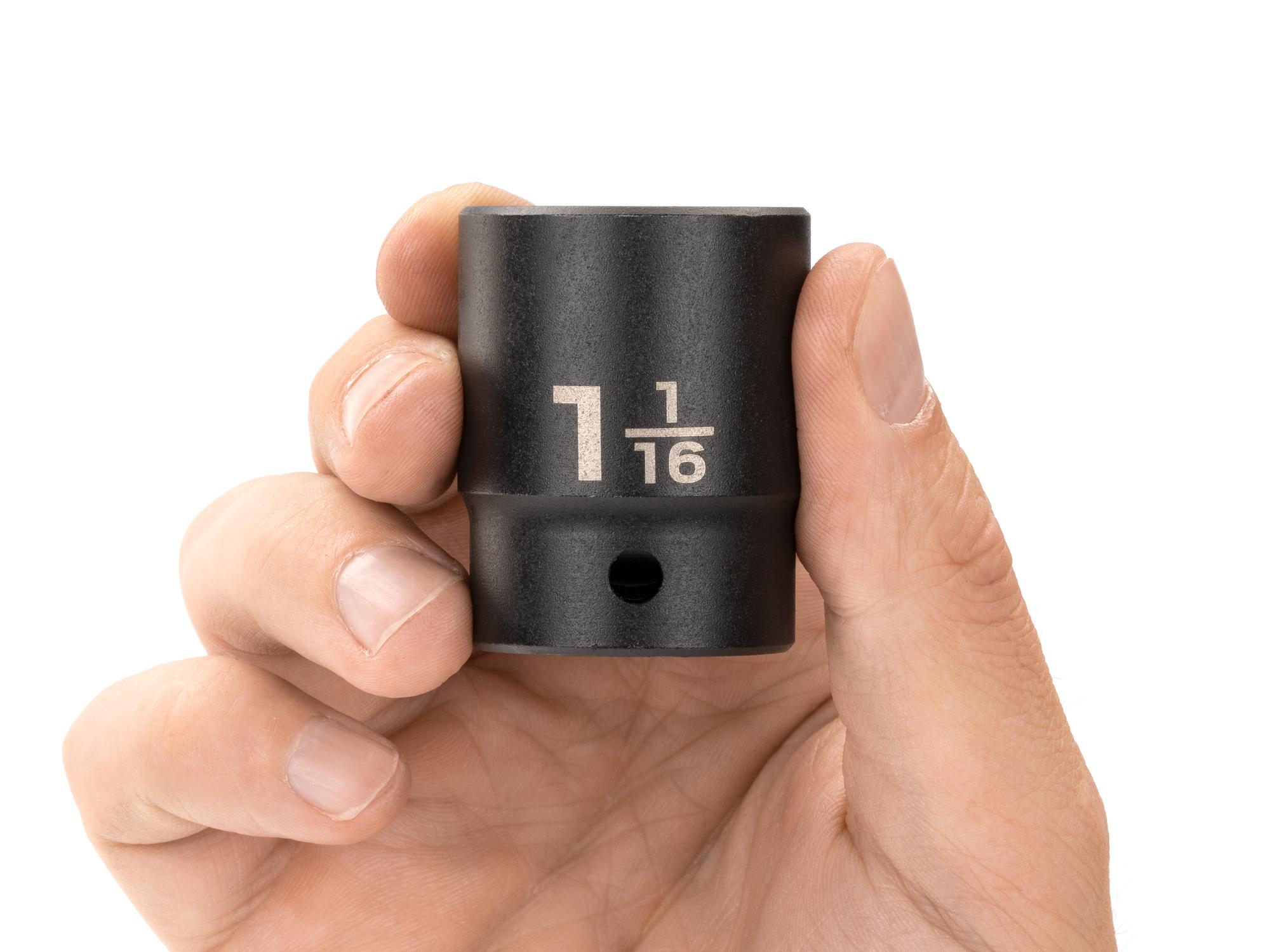 Person holding Tekton impact drive 12-point socket. Item #SID22227