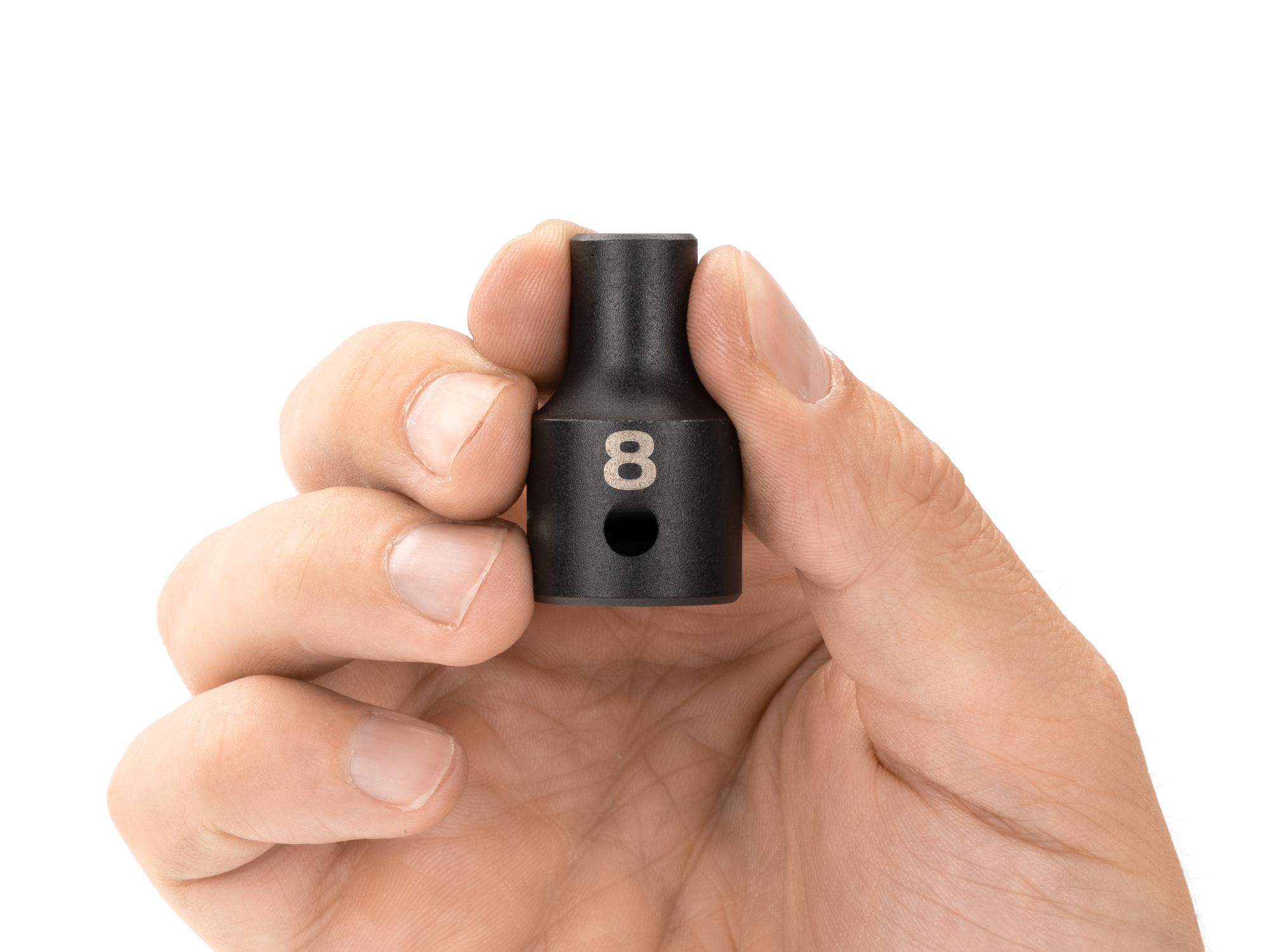 Person holding Tekton impact drive 12-point socket. Item #SID22308