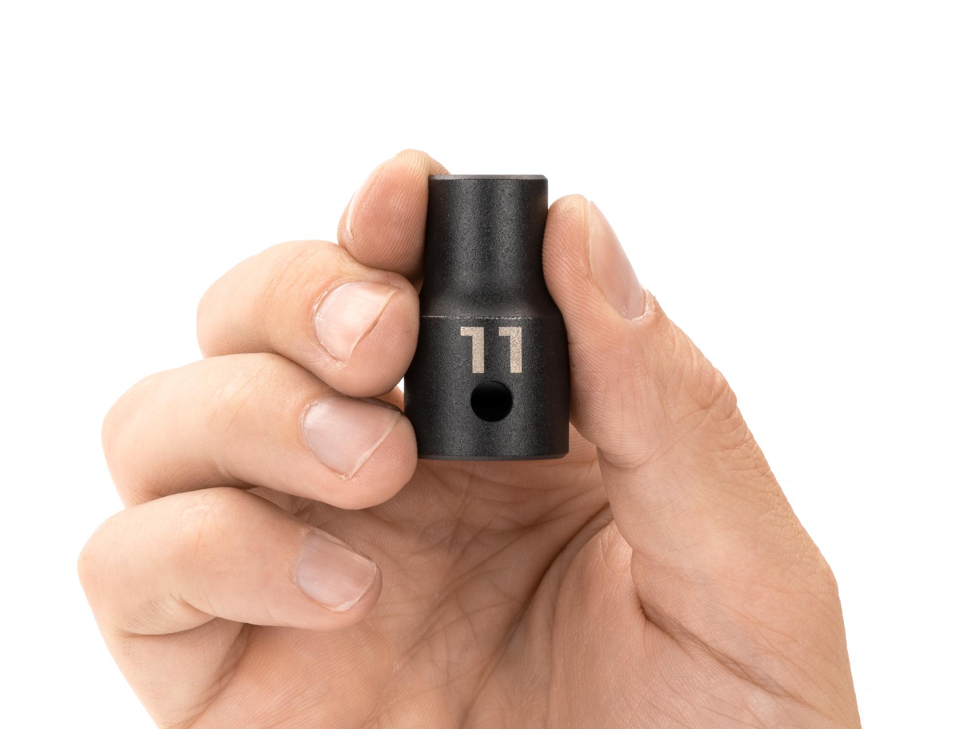 Person holding Tekton impact drive 12-point socket. Item #SID22311