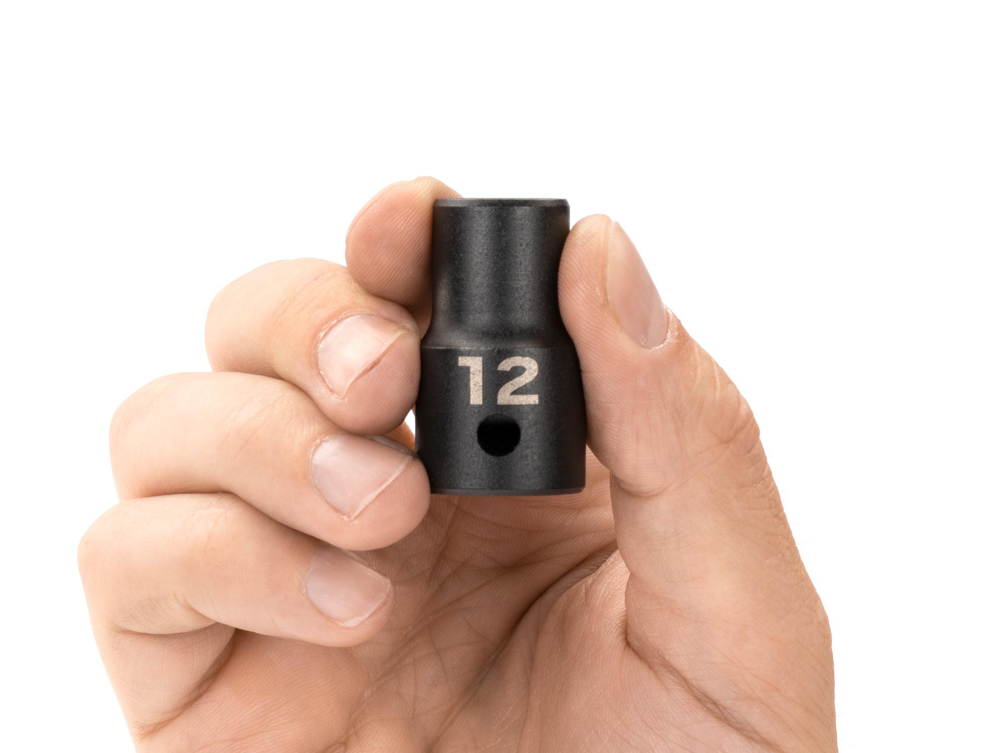 Person holding Tekton impact drive 12-point socket. Item #SID22312