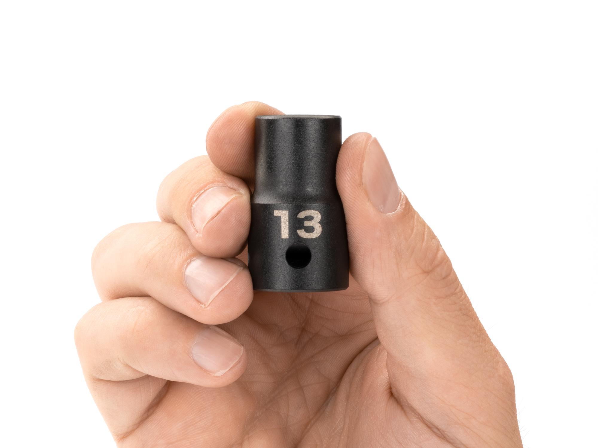 Person holding Tekton impact drive 12-point socket. Item #SID22313