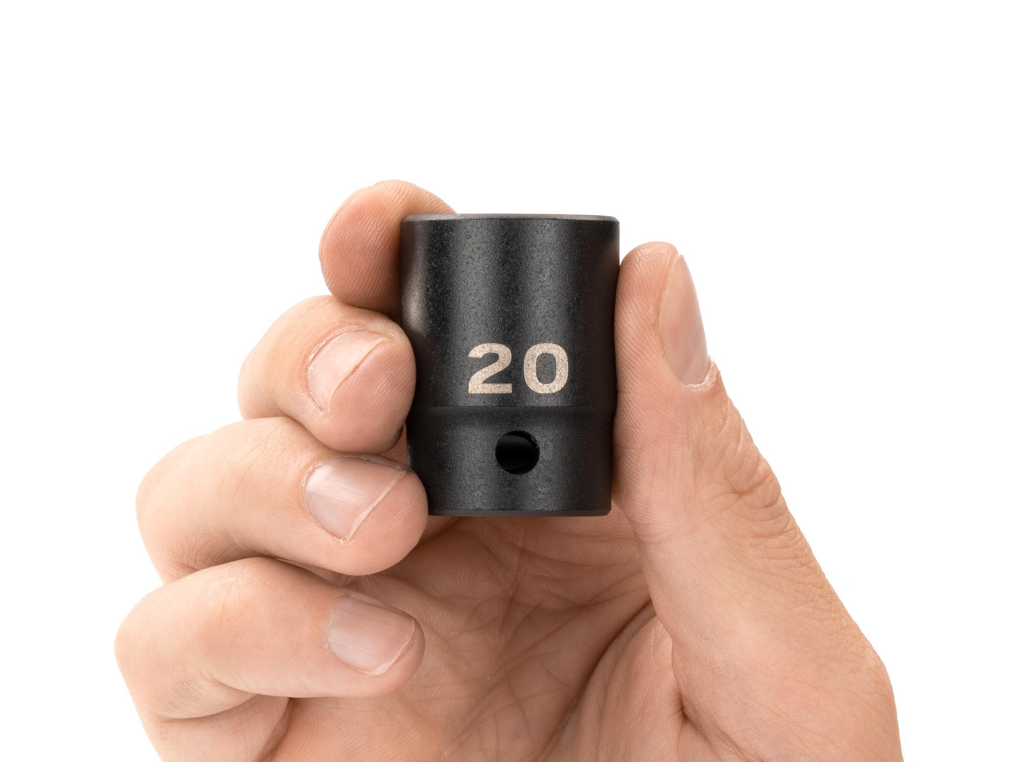 Person holding Tekton impact drive 12-point socket. Item #SID22320