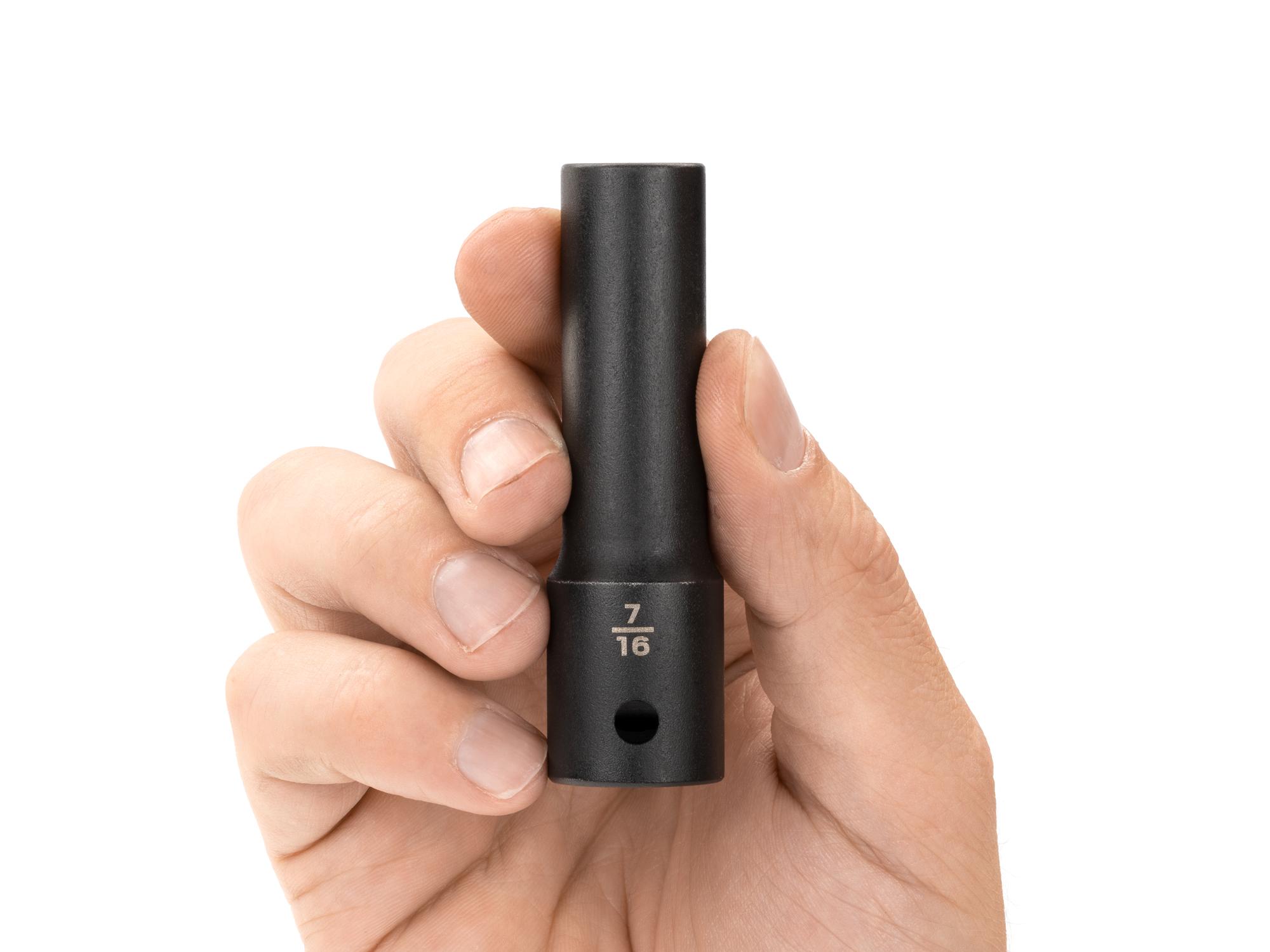 Person holding Tekton impact drive 12-point socket. Item #SID23211