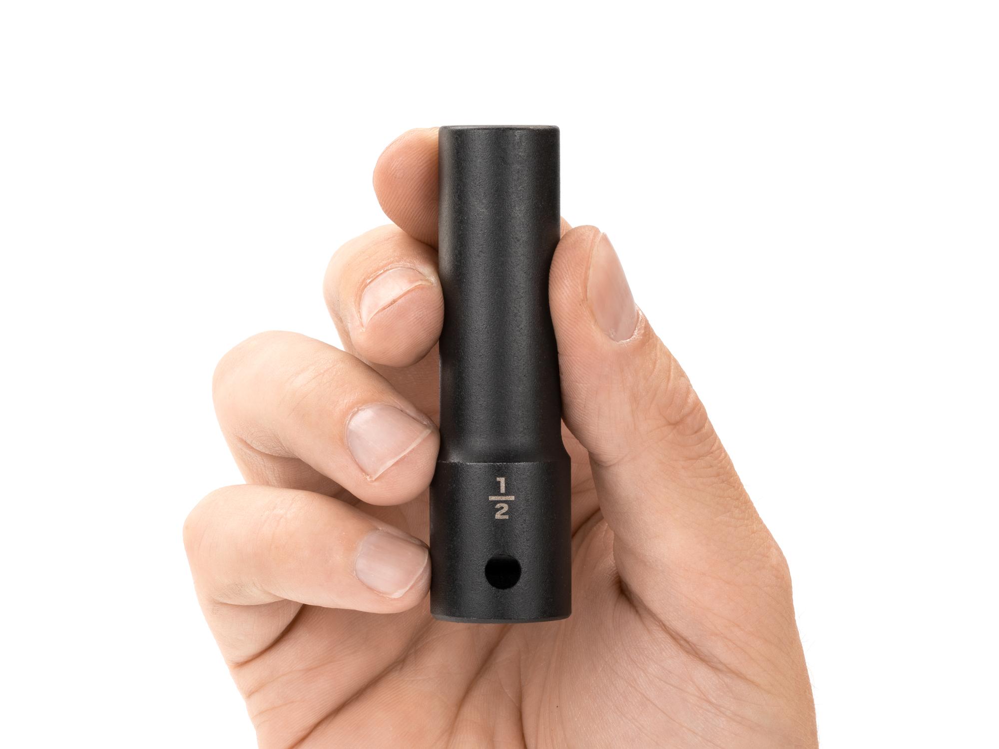 Person holding Tekton impact drive 12-point socket. Item #SID23213