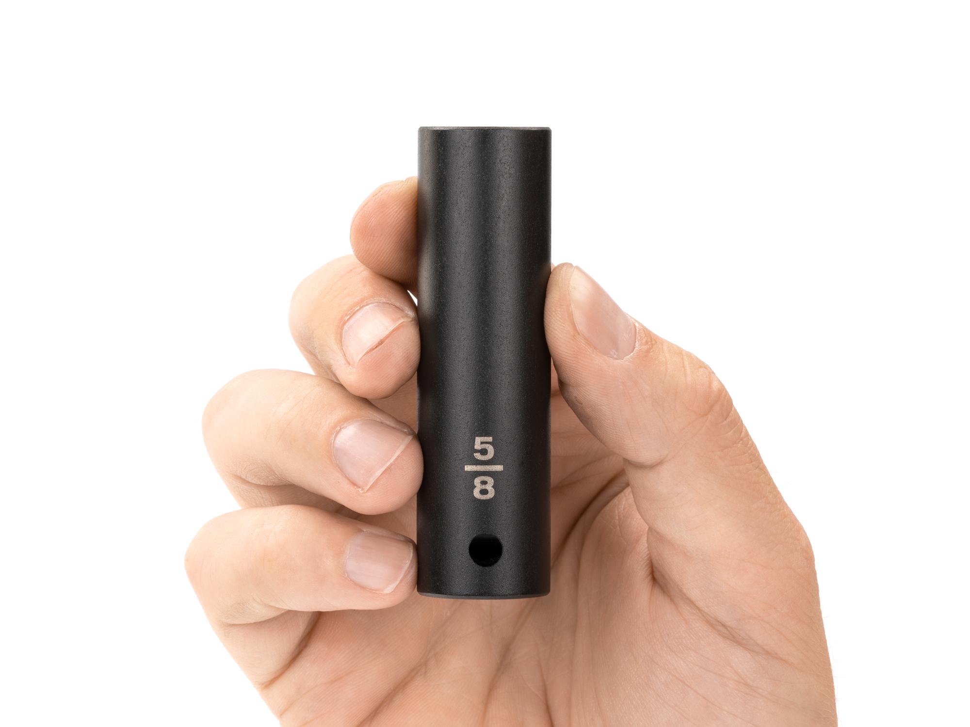 Person holding Tekton impact drive 12-point socket. Item #SID23216