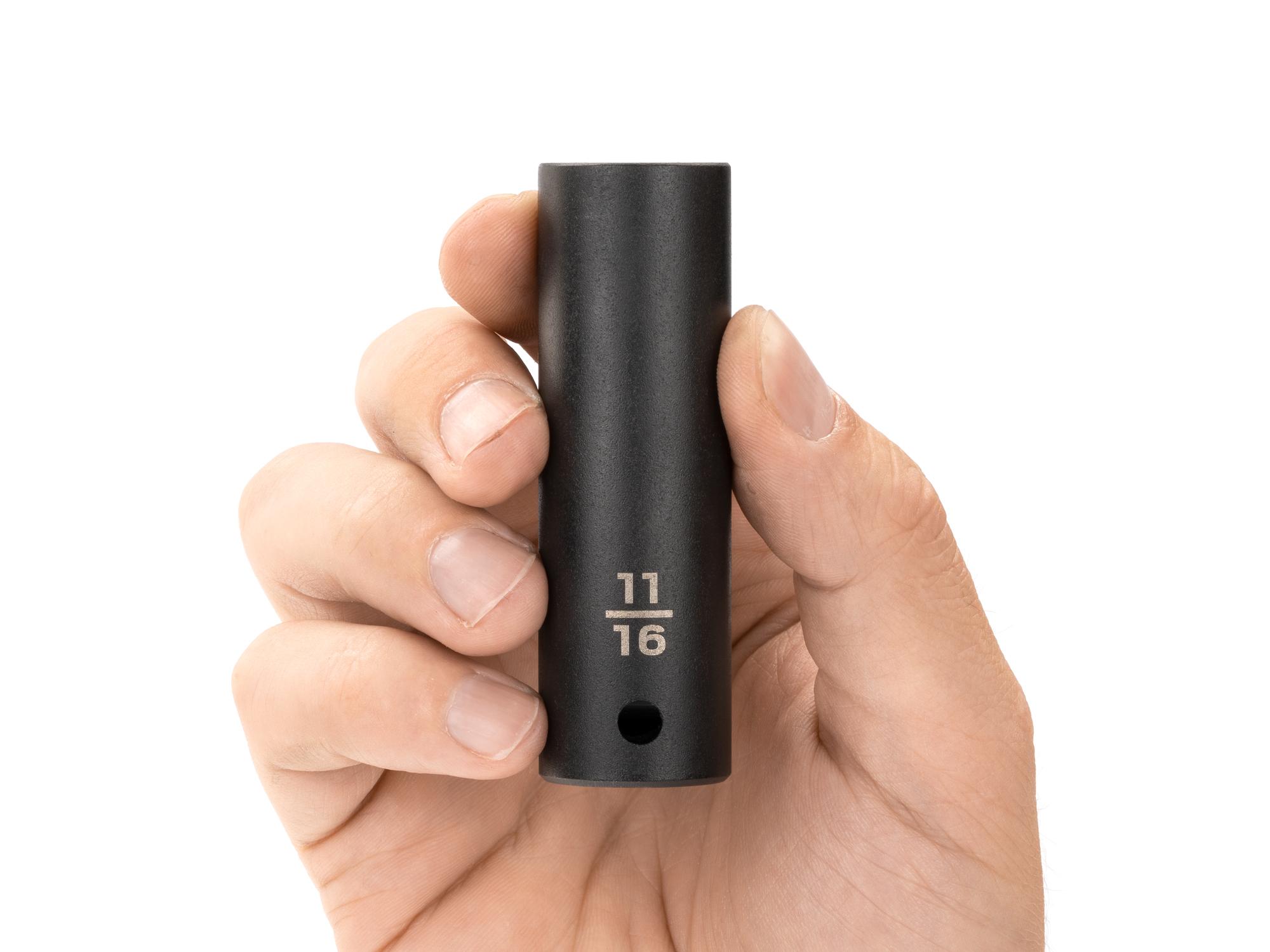Person holding Tekton impact drive 12-point socket. Item #SID23217
