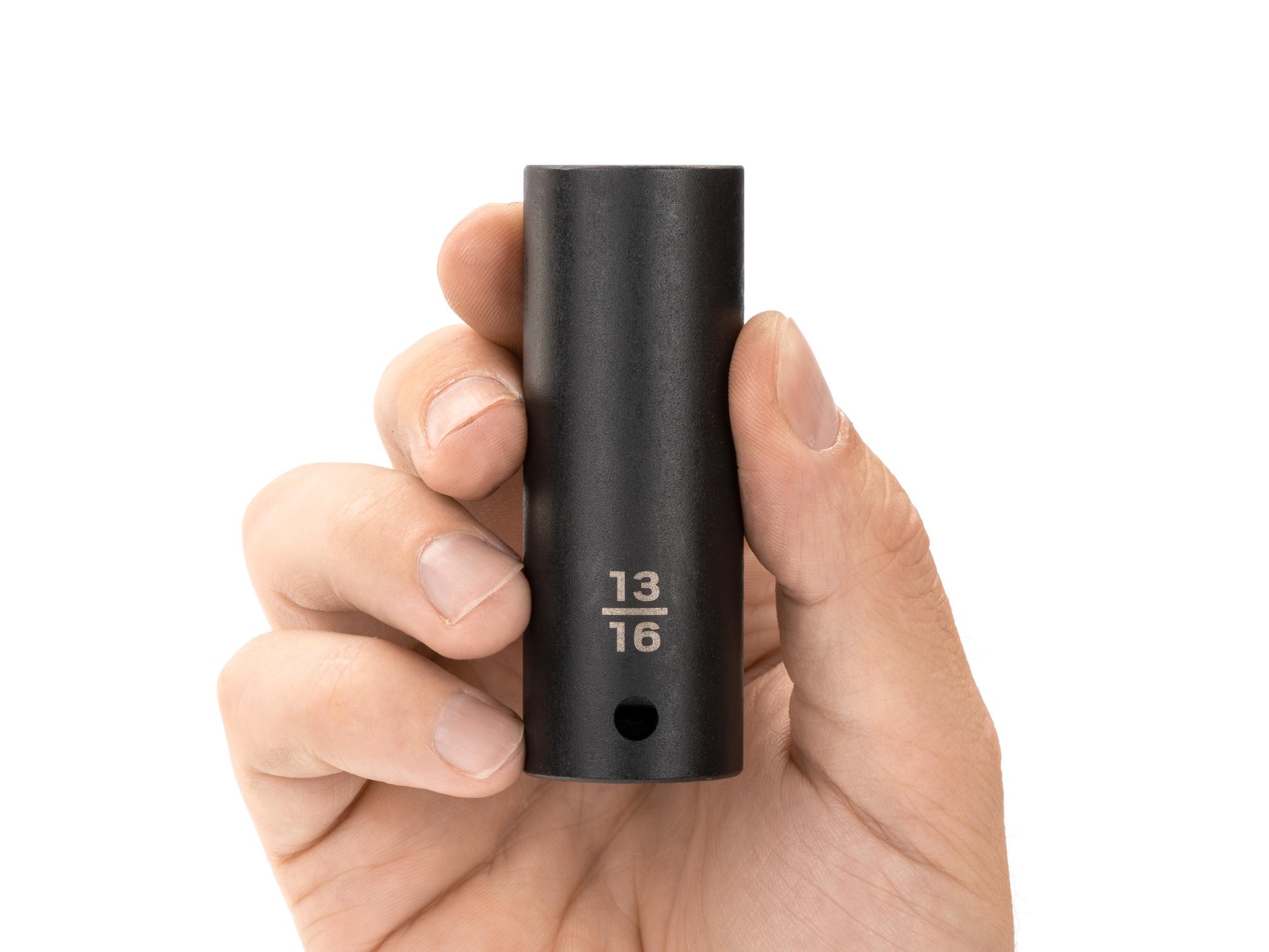 Person holding Tekton impact drive 12-point socket. Item #SID23221