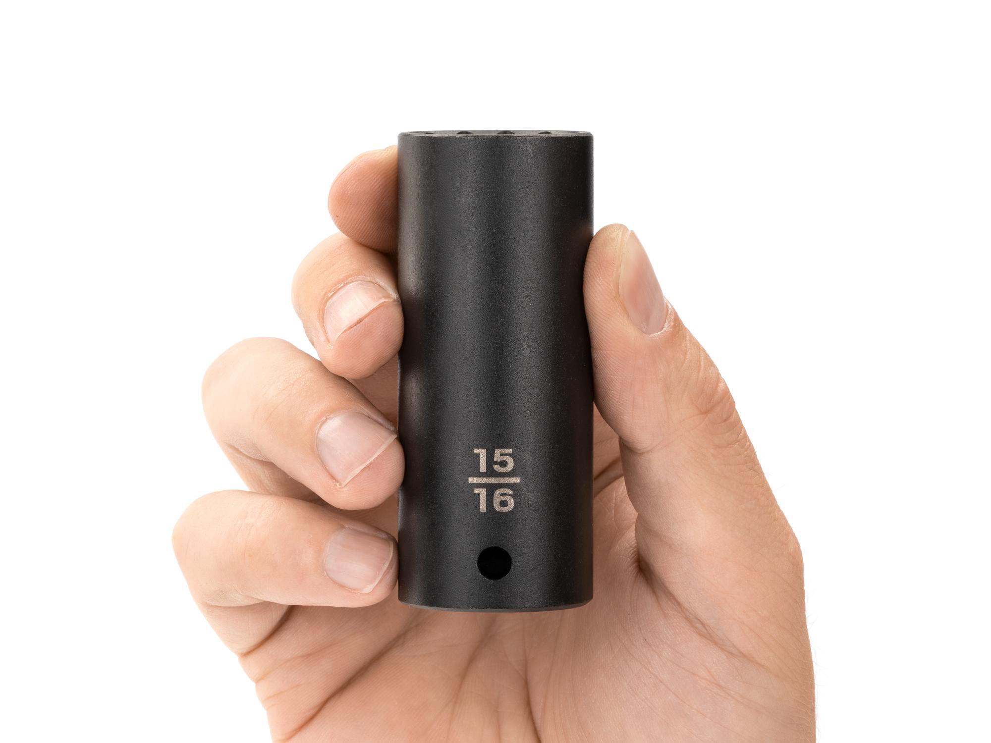 Person holding Tekton impact drive 12-point socket. Item #SID23224