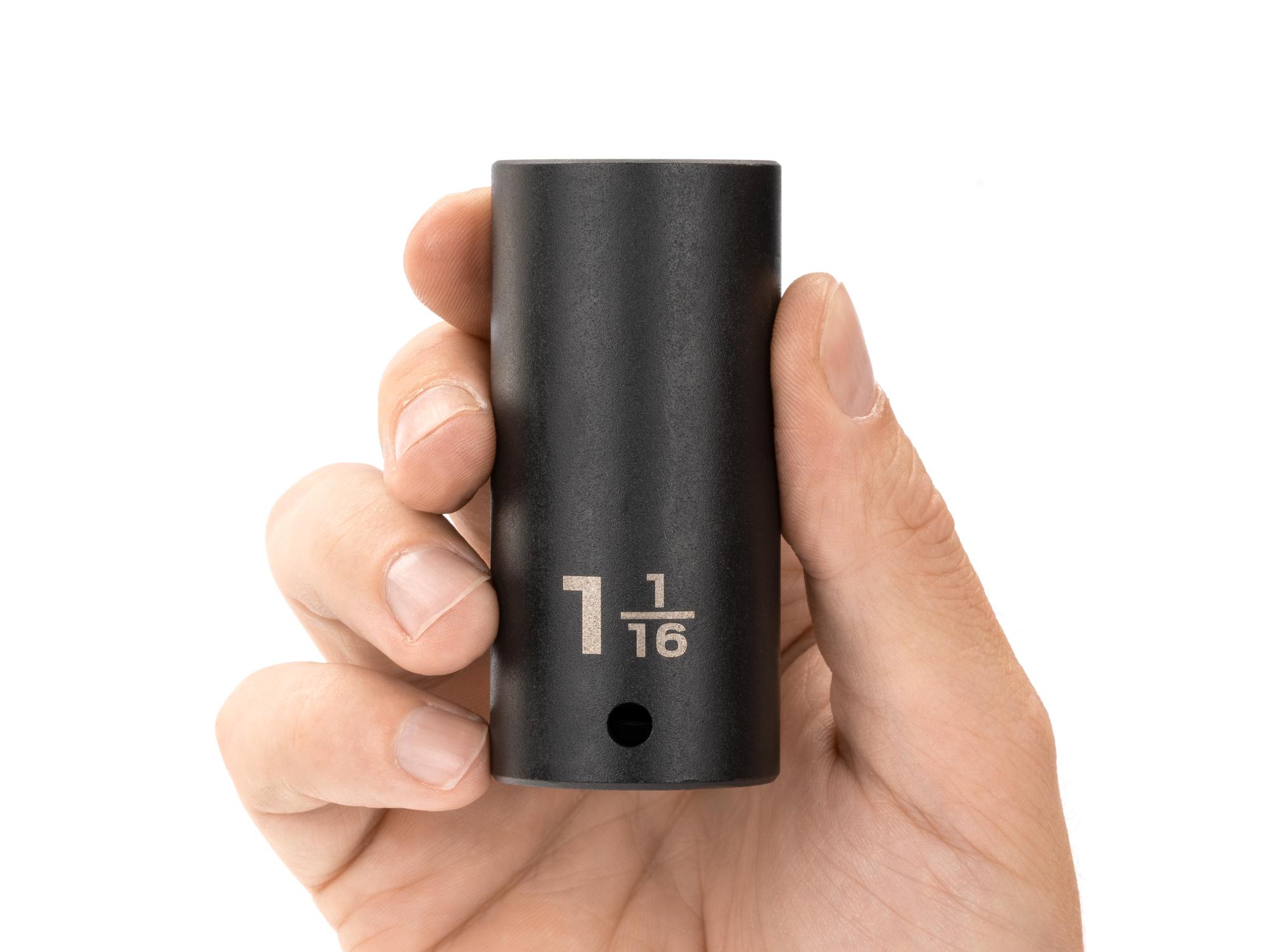 Person holding Tekton impact drive 12-point socket. Item #SID23227