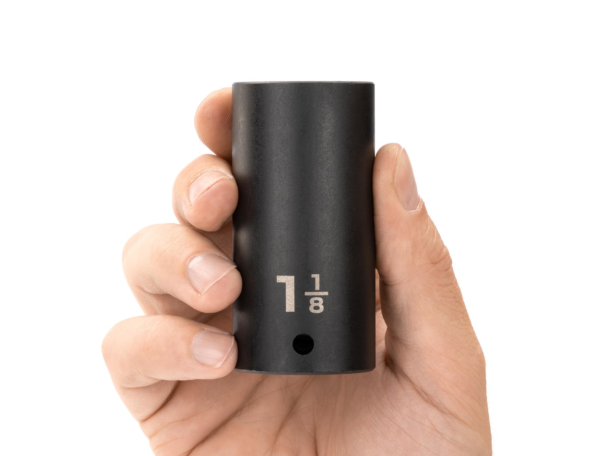 Person holding Tekton impact drive 12-point socket. Item #SID23229