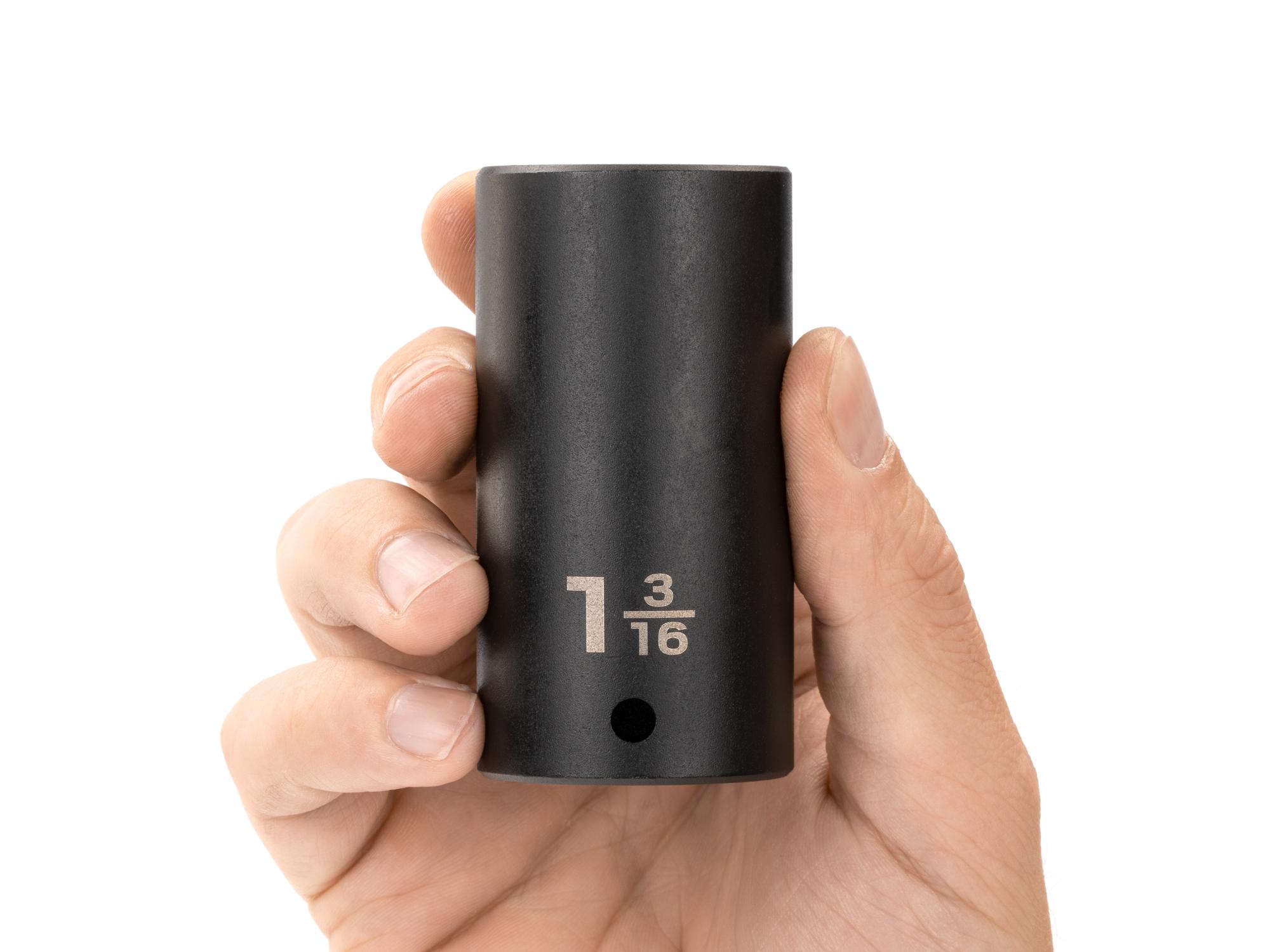 Person holding Tekton impact drive 12-point socket. Item #SID23230