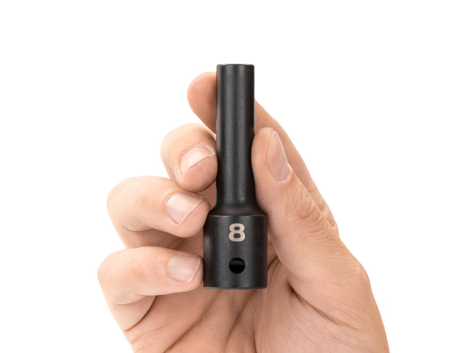 Person holding Tekton impact drive 12-point socket. Item #SID23308