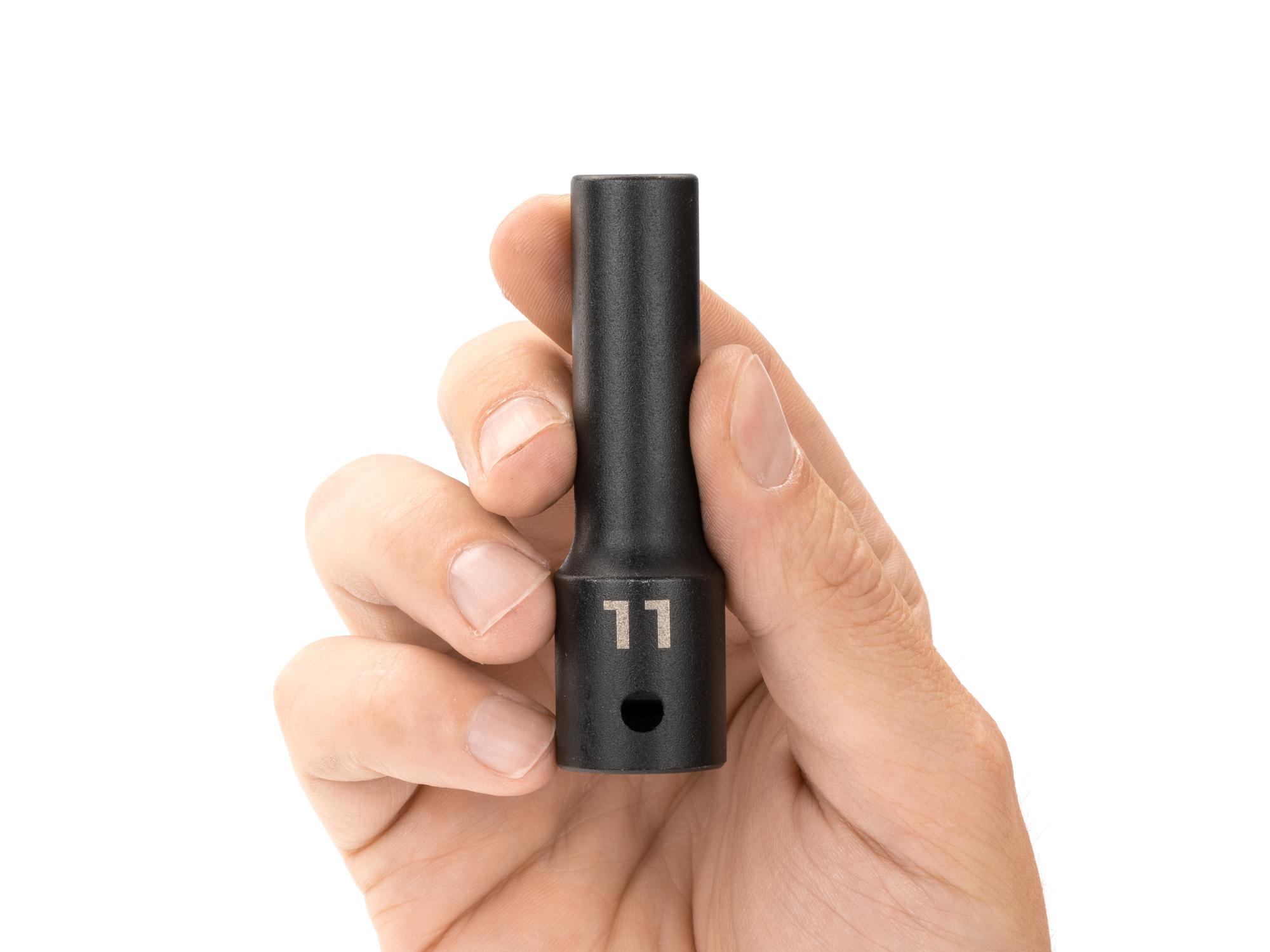 Person holding Tekton impact drive 12-point socket. Item #SID23311