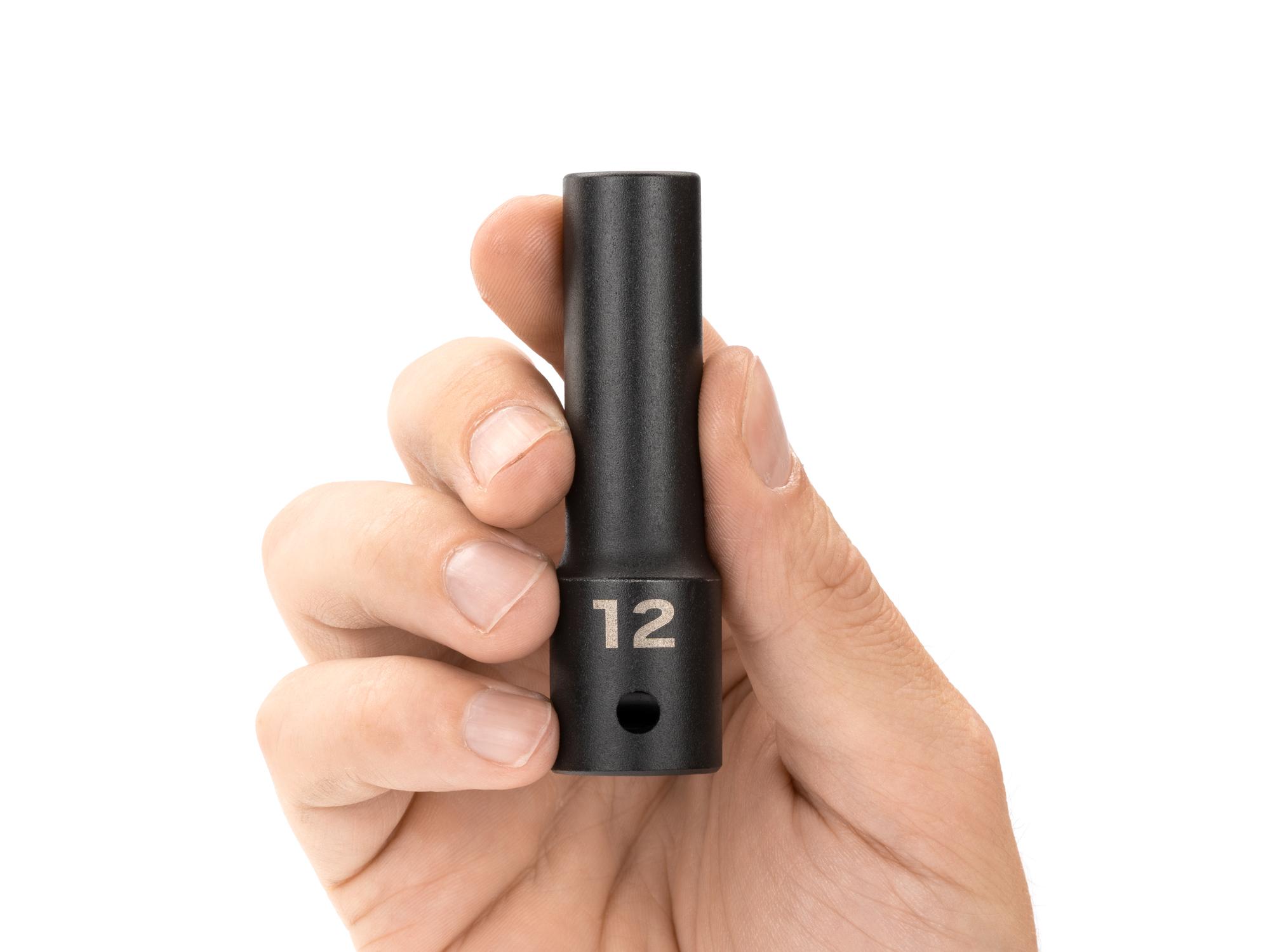 Person holding Tekton impact drive 12-point socket. Item #SID23312