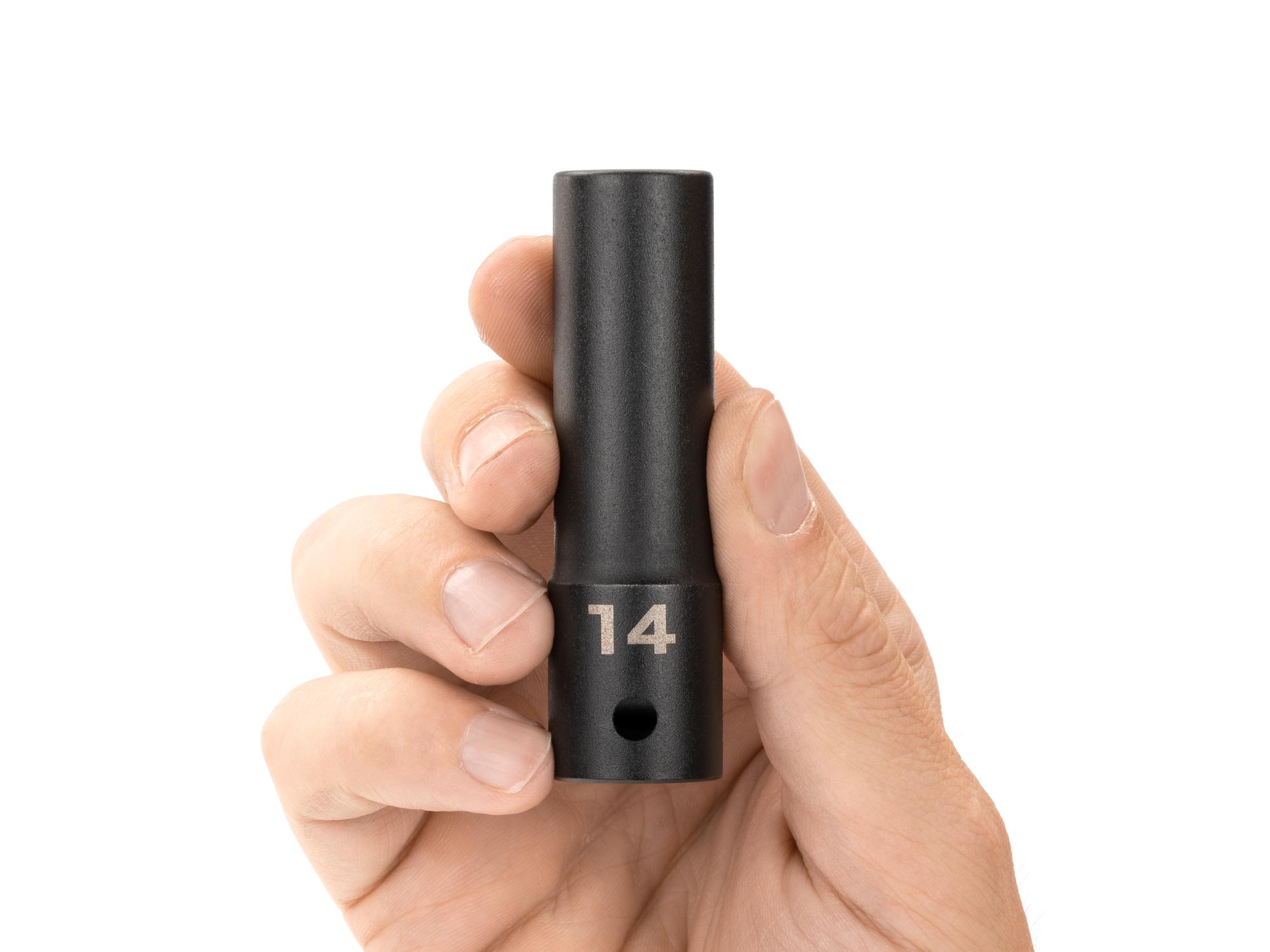 Person holding Tekton impact drive 12-point socket. Item #SID23314