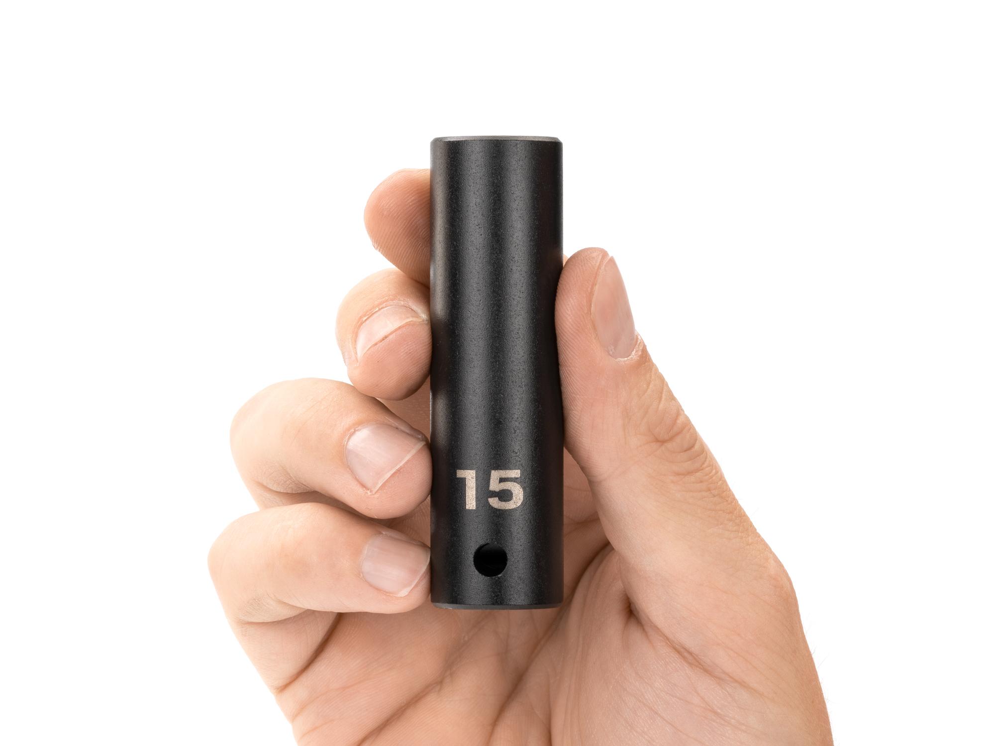 Person holding Tekton impact drive 12-point socket. Item #SID23315