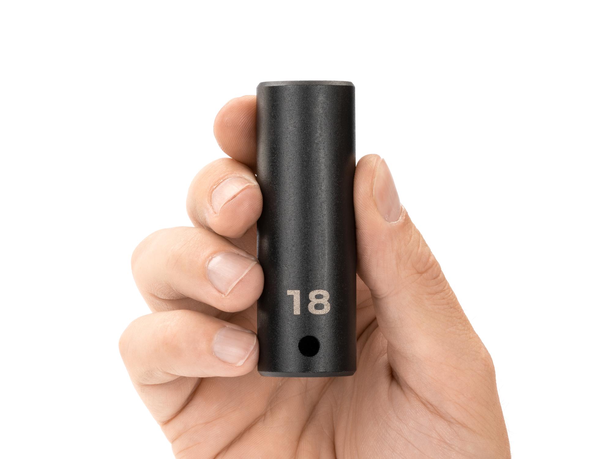 Person holding Tekton impact drive 12-point socket. Item #SID23318