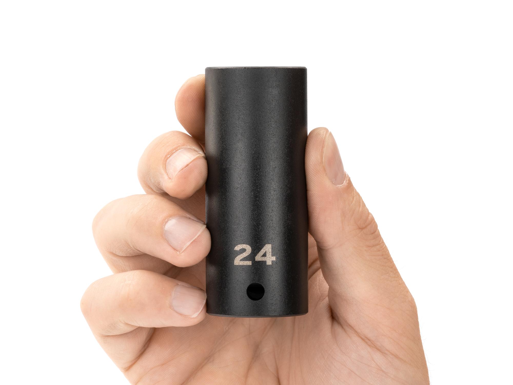 Person holding Tekton impact drive 12-point socket. Item #SID23324
