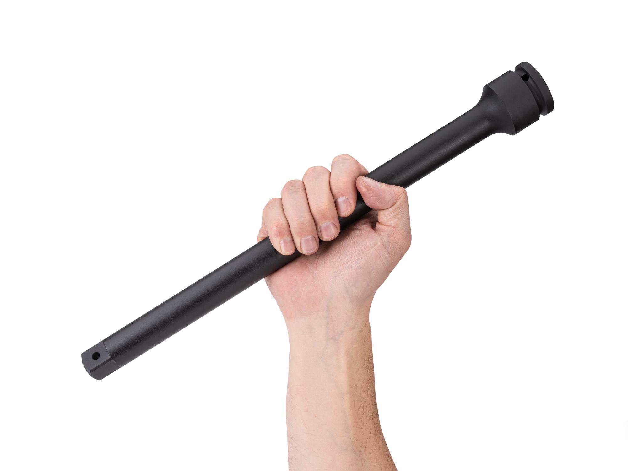 Person holding Tekton 16 inch impact drive accessory. Item #SIA31016