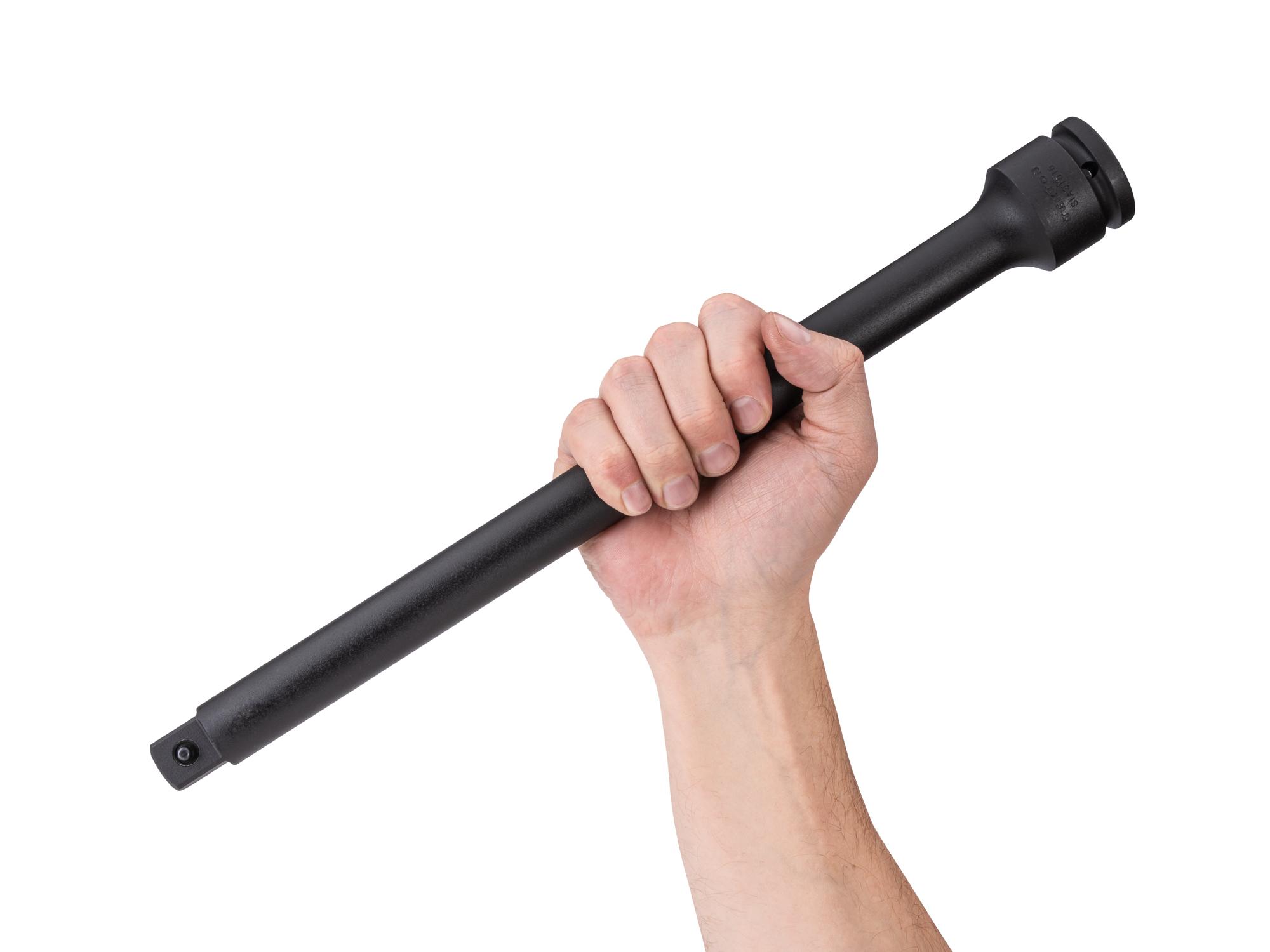 Person holding Tekton 16 inch impact drive accessory. Item #SIA31516
