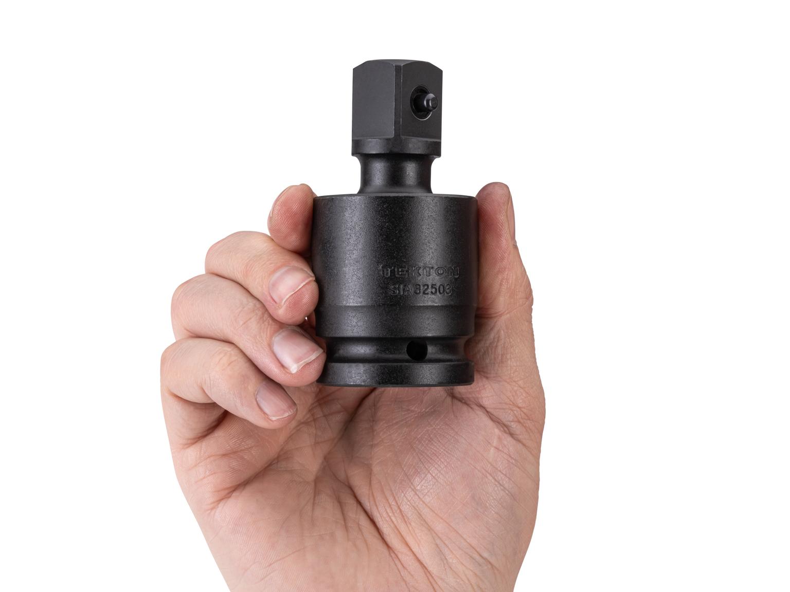 Person holding Tekton impact drive 6-point socket. Item #SIA32503