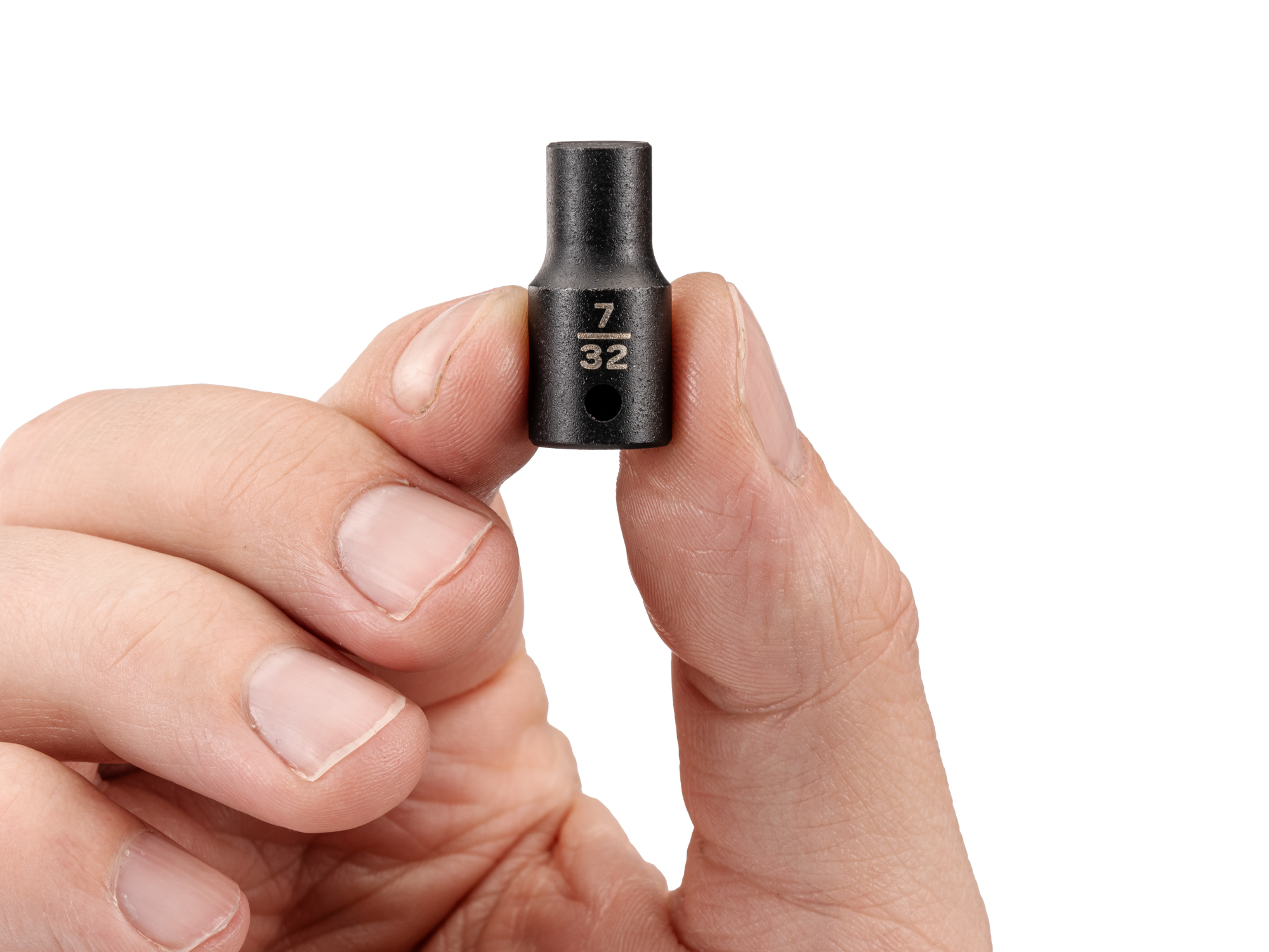 Person holding  Tekton 7/32 inchimpact drive 6-point socket